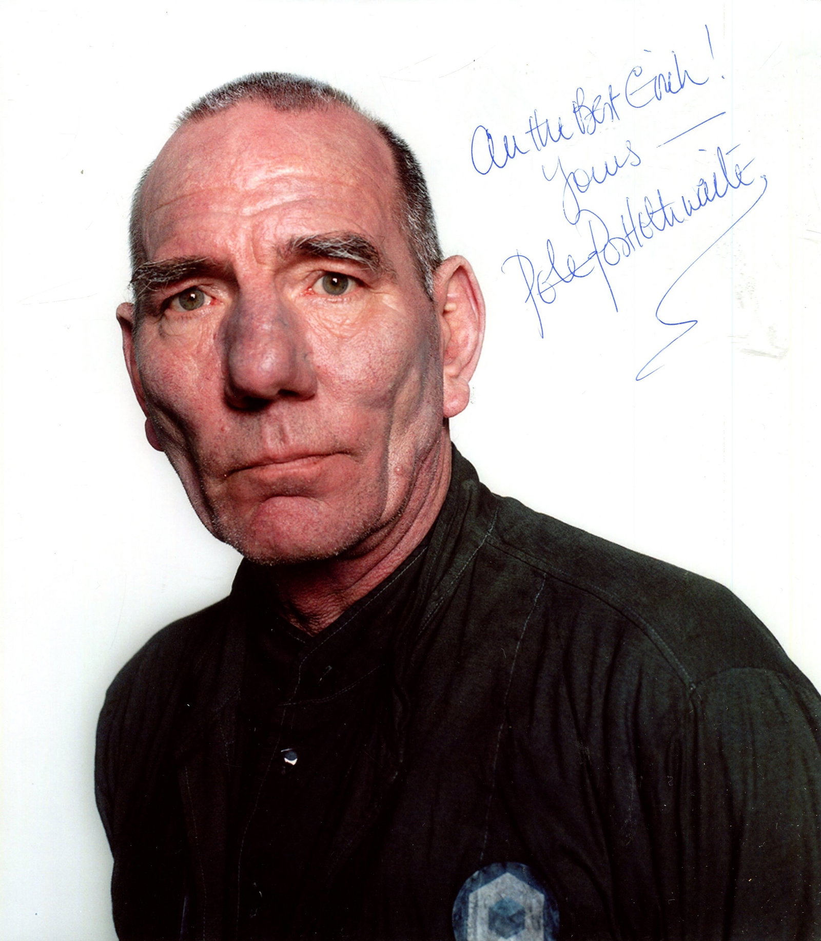 POSTLETHWAITE PETE: (1946-2011): POSTLETHWAITE PETE: (1946-2011) English Actor. Signed and inscribed colour 8 x 9 photograph, the image depicting Postlethwaite in a head and shoulders pose. Signed and inscribed in blue pen ink with