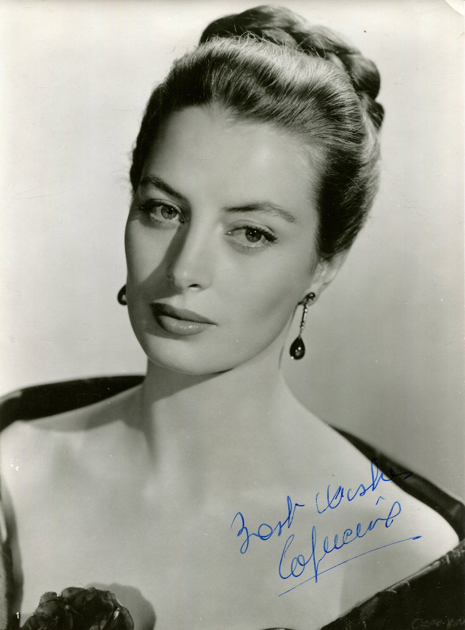 CAPUCINE: (1928-1990): CAPUCINE: (1928-1990) French actress, remembered for her portrayal of Simone Clouseau, Inspector Clouseau´s wife, in the detective comedy film The Pink Panther (1963). Vintage signed 7 x 9.5