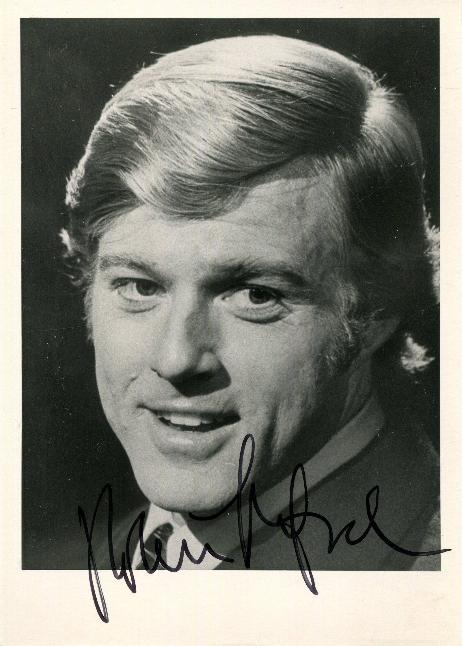 ACTORS: (x11): ACTORS: A good selection of signed 4 x 6 photographs by various film actors comprising Robert Redford, Robert Mitchum, Eddie Albert, Mel Ferrer, Raymond Burr, Richard Harris, Larry Hagman, Louis
