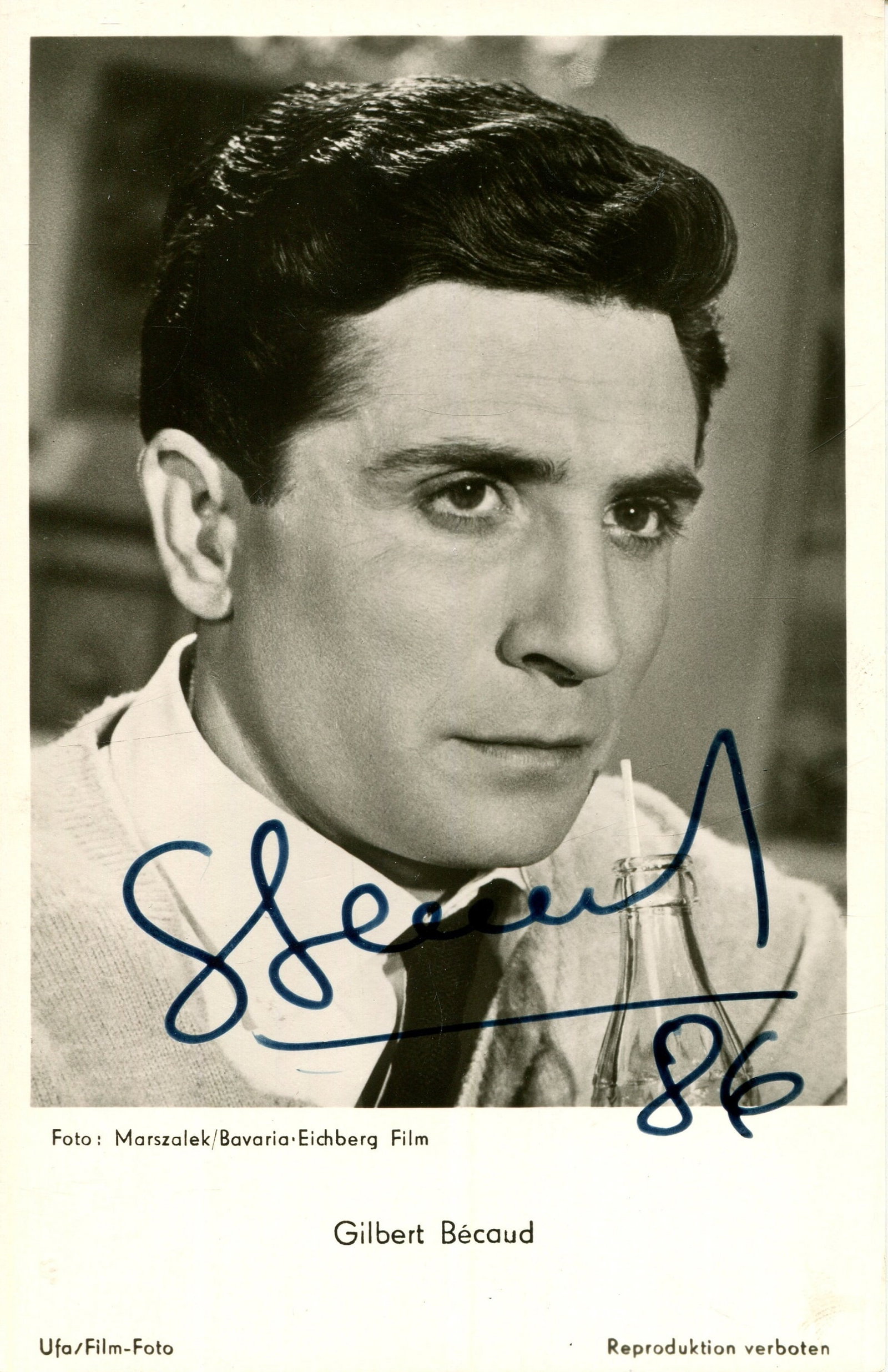 BECAUD GILBERT: (1927-2001): BECAUD GILBERT: (1927-2001) French singer, composer, and actor, known as "Monsieur 100,000 Volts" for his energetic performances. His best-known hits are Nathalie and Et Maintenant, a 1961 release