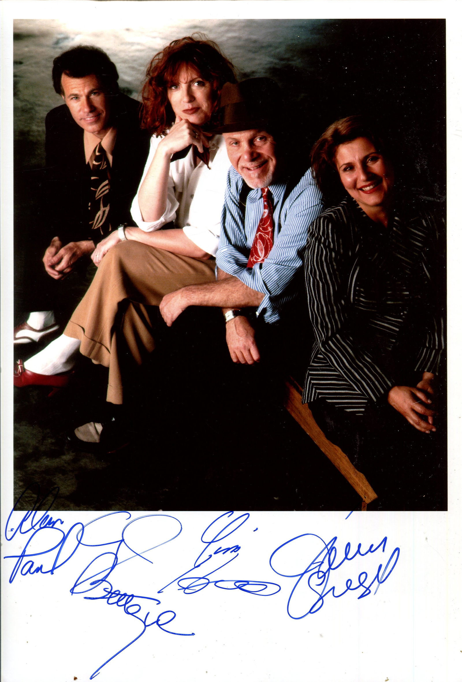 THE MANHATTAN TRANSFER: THE MANHATTAN TRANSFER: Signed colour 8 x 12 photograph by all four members of the American vocal group individually, comprising Tim Hauser (1941-2014), Janis Siegel (1952- ), Alan Paul (1949- ) and