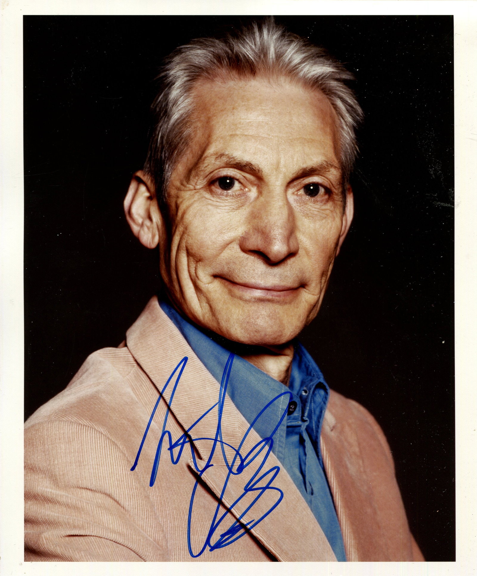 THE ROLLING STONES: (x2): THE ROLLING STONES: Charlie Watts (1941-2021) English musician, drummer of the Rolling Stones from 1963 until his death in 2021. Signed colour 8 x 10 photograph of Watts in a smiling head and