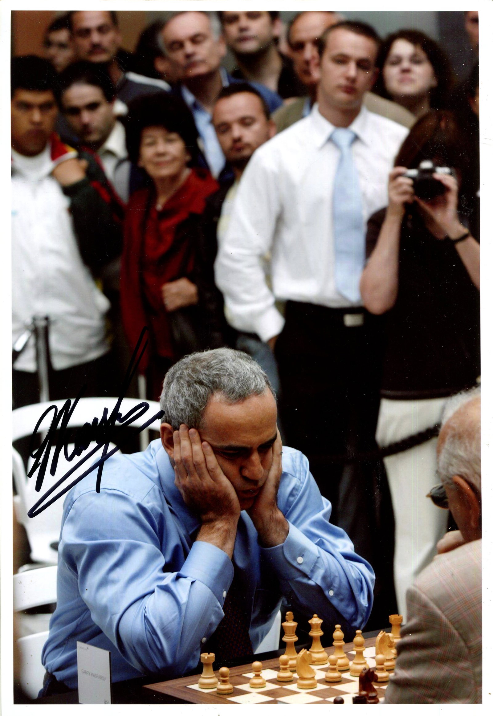 KASPAROV GARRY: (1963- ): KASPAROV GARRY: (1963- ) Russian Chess Grandmaster, undisputed World Chess Champion 1985-1993 and considered by many to be the greatest chess player of all time. A very good signed 8 x 12 colour