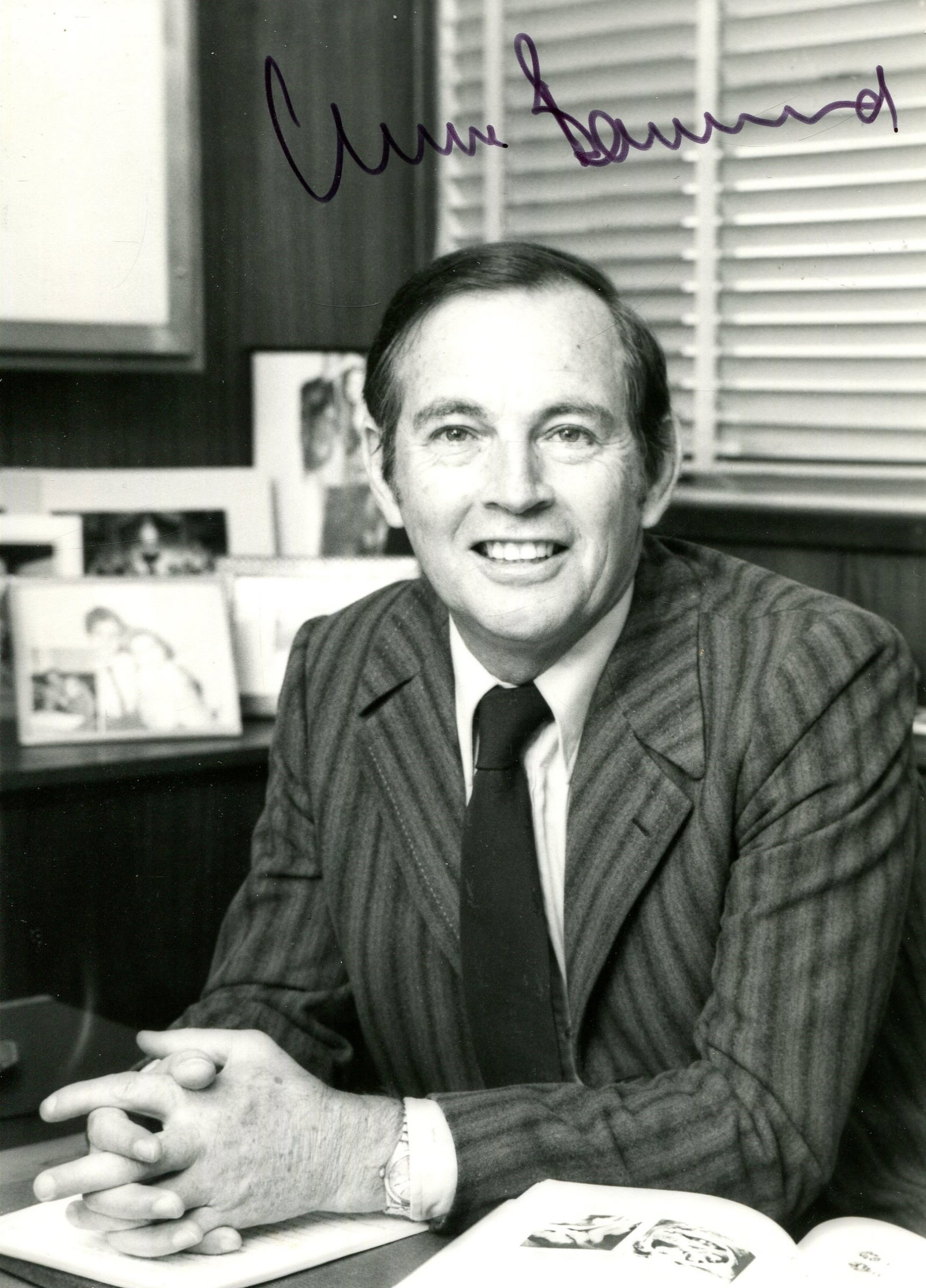 BARNARD CHRISTIAAN: (1922-2001): BARNARD CHRISTIAAN: (1922-2001) South African cardiac surgeon who performed the world's first human-to-human heart transplant operation, 1967. Signed 5 x 7 photograph of Barnard seated in a