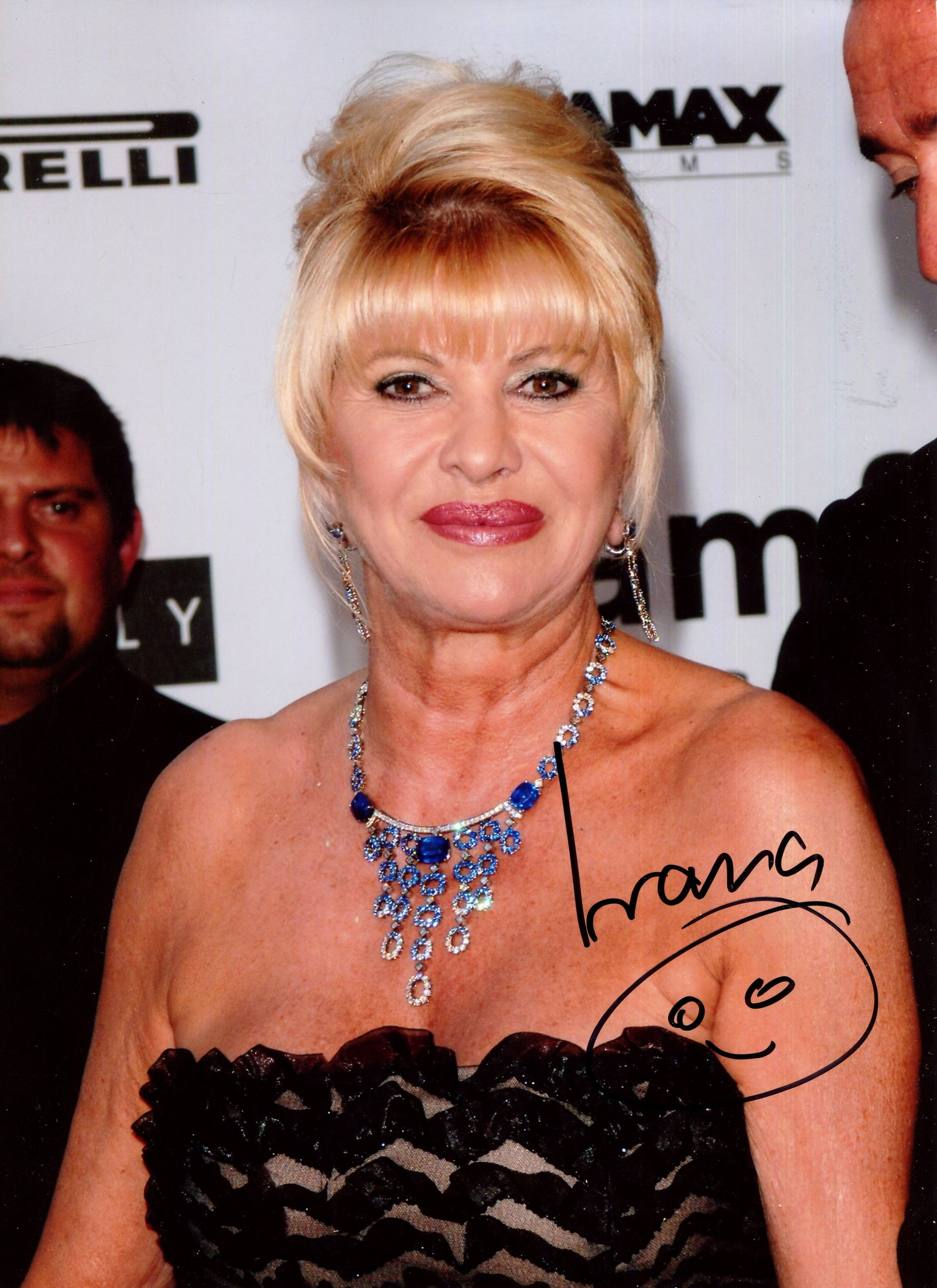 TRUMP IVANA: (1949-2022): TRUMP IVANA: (1949-2022) Czech-American businesswoman, socialite and model, the wife of Donald Trump from 1977-90. Signed colour 8 x 11 photograph of Trump in a head and shoulders pose at a red