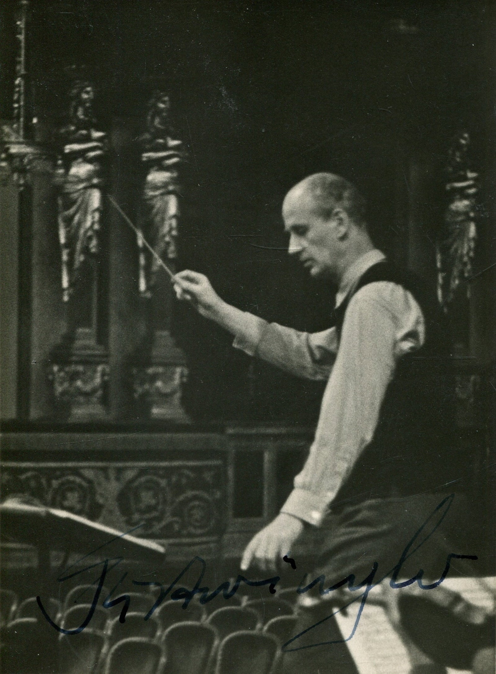 FURTWANGLER WILHELM: (1886-1954): FURTWANGLER WILHELM: (1886-1954) German conductor. A fine vintage signed 3.5 x 4.5 postcard photograph of Furtwangler standing in a three-quarter length pose with a baton in his hand, conducting