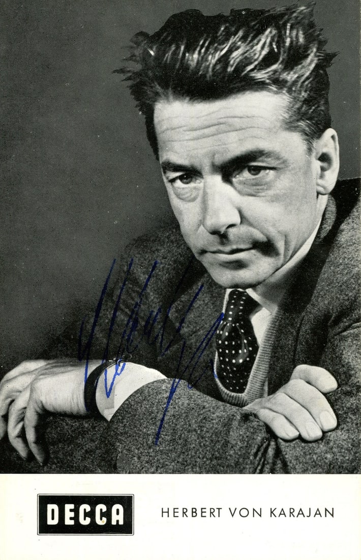 KARAJAN HERBERT VON: (1908-1989): KARAJAN HERBERT VON: (1908-1989) Austrian Conductor. A very fine vintage signed 3.5 x 5.5 photograph, the promotional DECCA image depicting Karajan in a head and shoulders pose. Signed in blue ink to