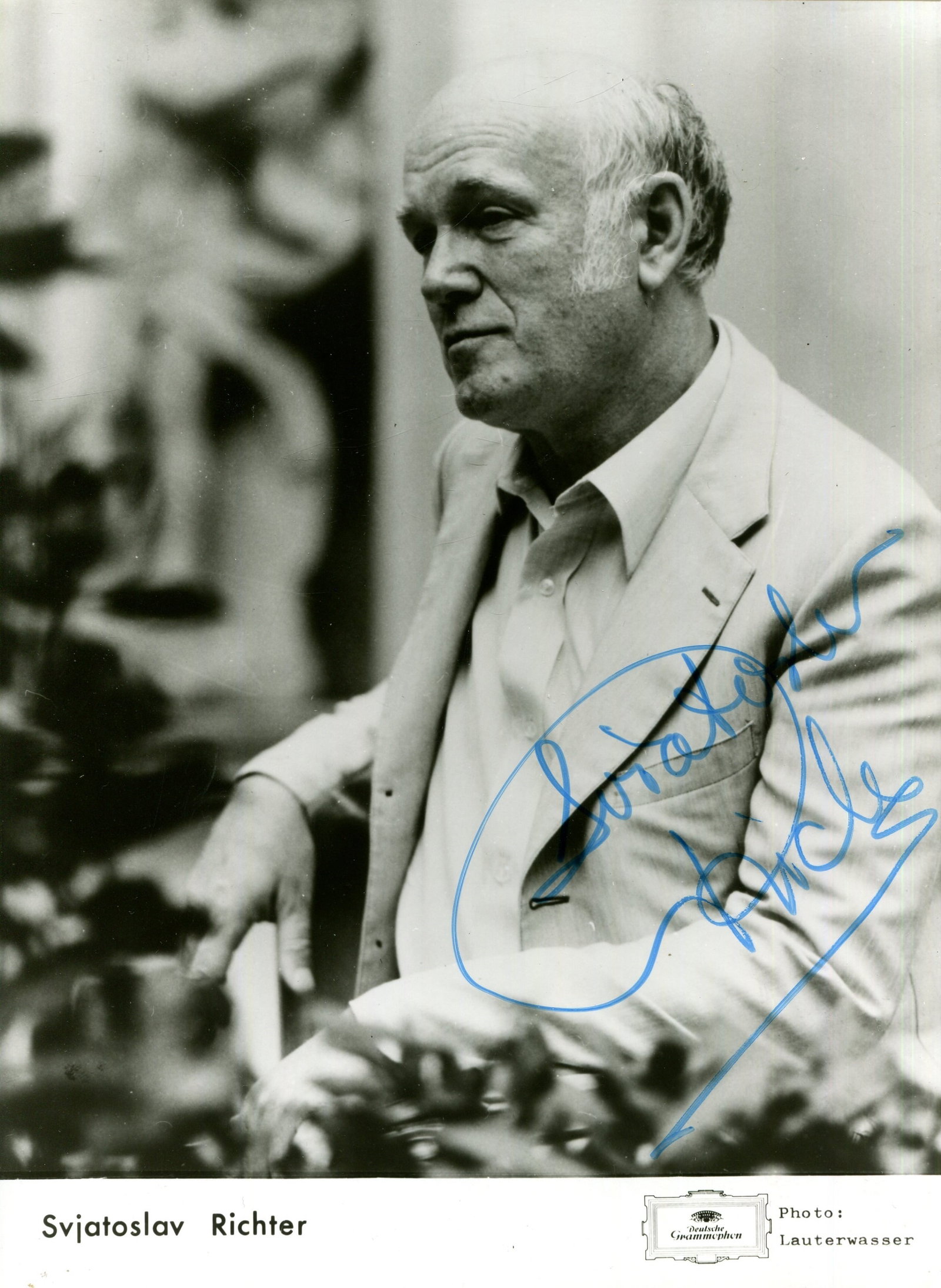 RICHTER SVIATOSLAV: (1915-1997): RICHTER SVIATOSLAV: (1915-1997) Russian Pianist. Signed 7 x 9.5 photograph by Richter, the promotional Deutsche Grammophon image depicting the virtuoso Richter seated in a half-length pose. Signed in