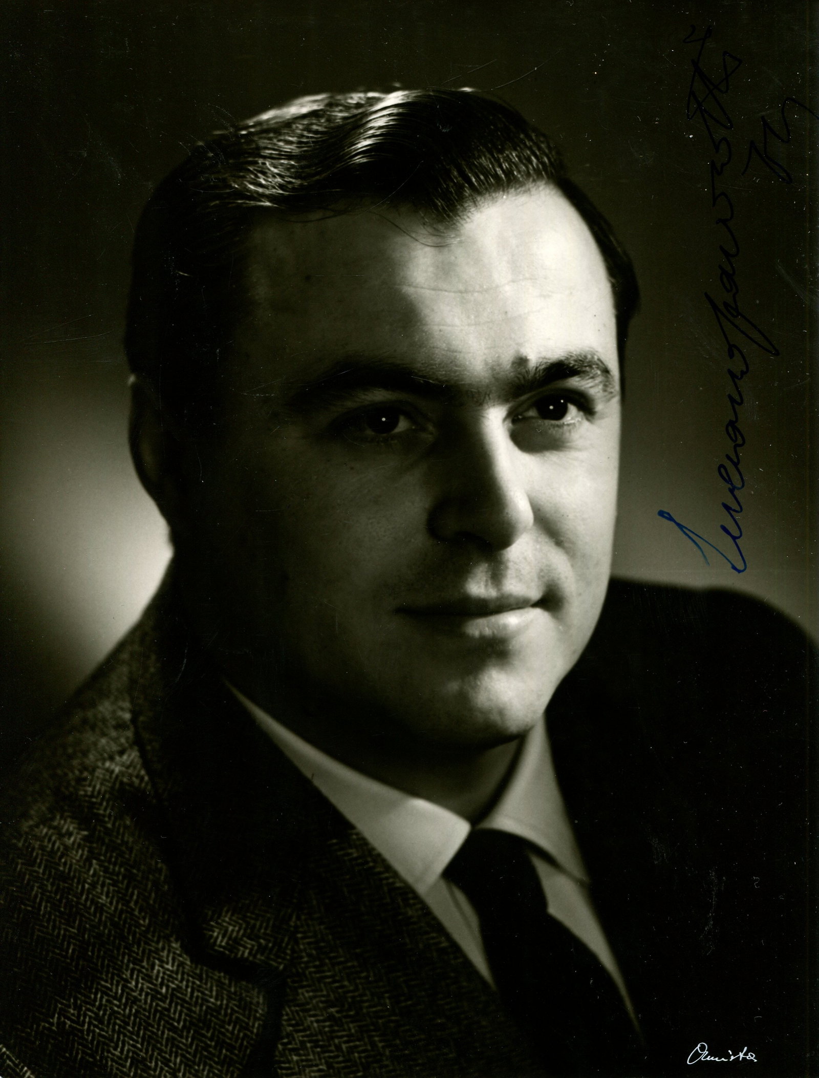 PAVAROTTI LUCIANO: (1935-2007): PAVAROTTI LUCIANO: (1935-2007) Italian tenor. A very fine and early signed 7 x 9 photograph of Pavarotti in a head and shoulders pose. Signed in bold blue ink, with his full name alone to a clear
