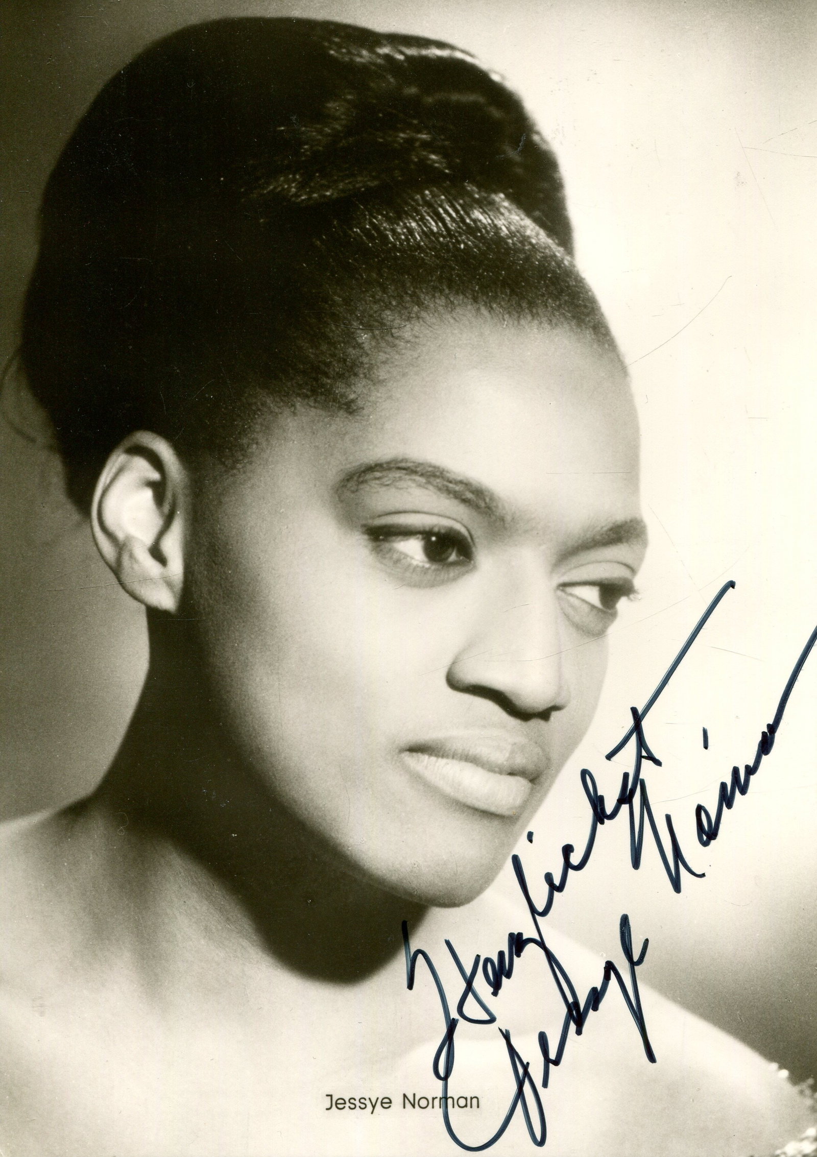 NORMAN JESSYE: (1945-2019): NORMAN JESSYE: (1945-2019) American dramatic soprano. An excellent signed postcard photograph by Jessye Norman, the Horst Maack image from Berlin showing the opera singer in a close-up portrait pose.