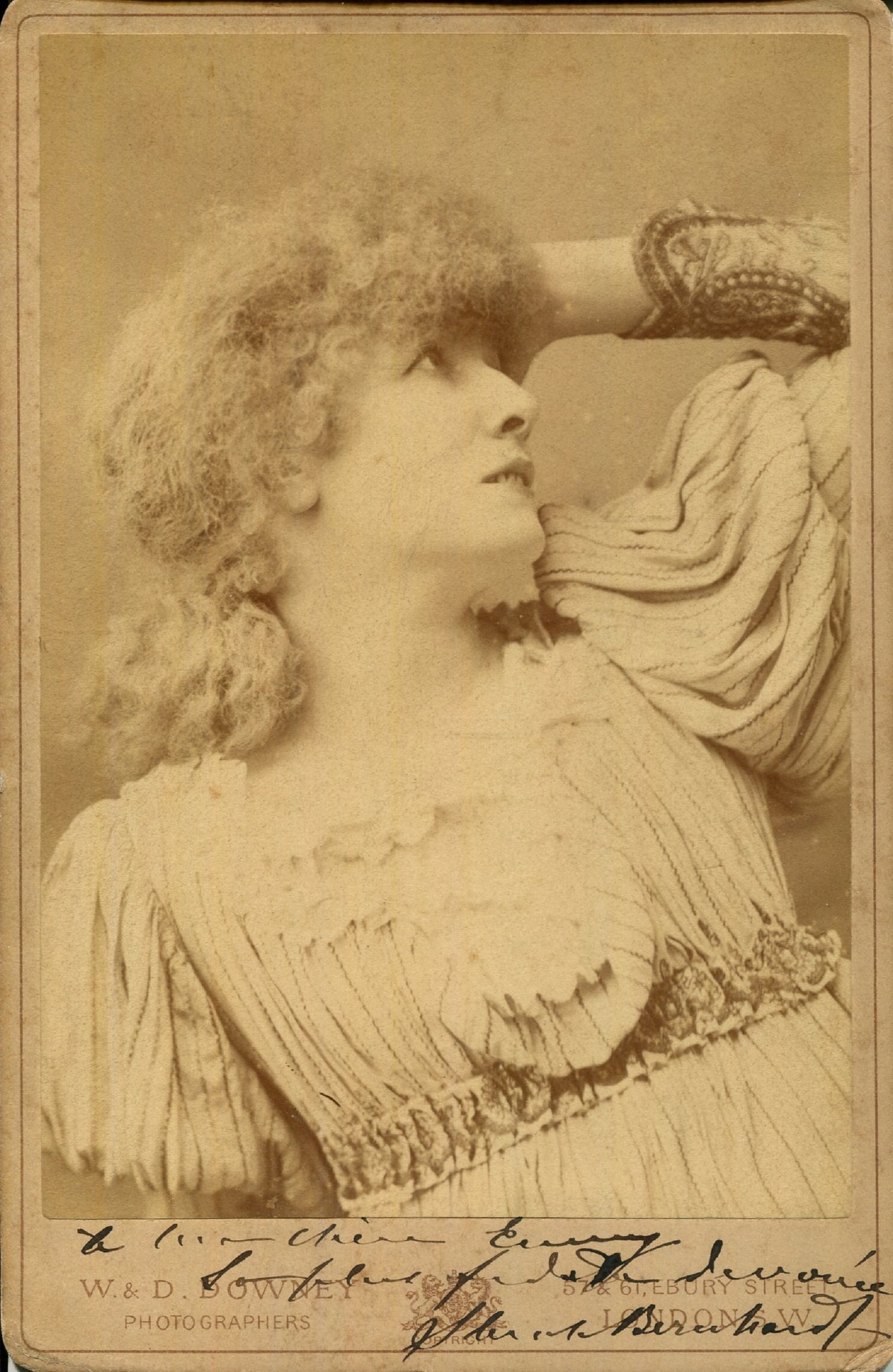 BERNHARDT SARAH: (1844-1923): BERNHARDT SARAH: (1844-1923) French stage actress. A good vintage signed and inscribed cabinet photograph by Bernhardt, the sepia albumen print by W. & D. Downey of London depicting The Divine Sarah i