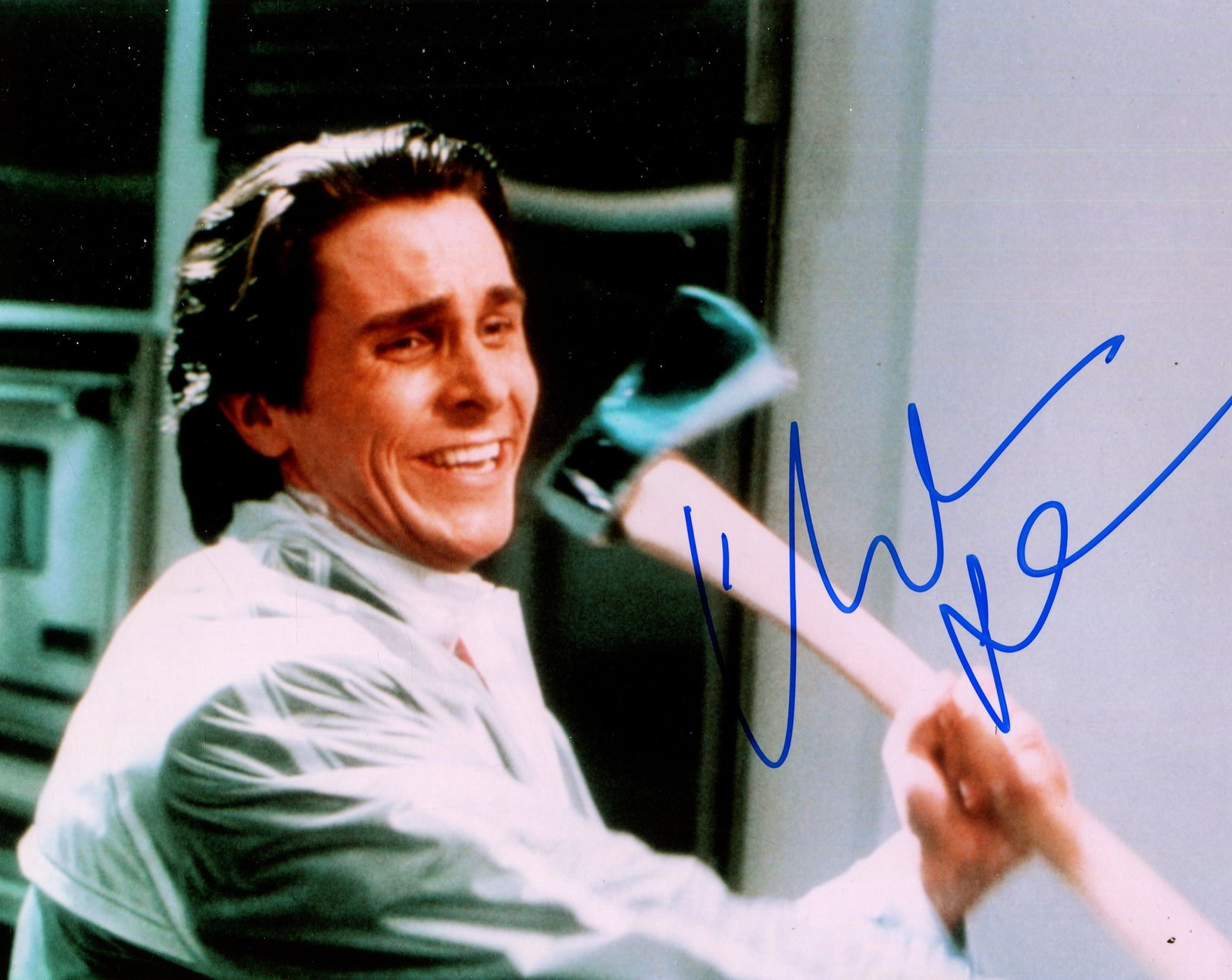 BALE CHRISTIAN: (1974- ): BALE CHRISTIAN: (1974- ) English-born American Actor, Academy Award winner. Signed colour 10 x 8 photograph of Bale in a head and shoulders pose in costume as Patrick Bateman, holding an axe in a