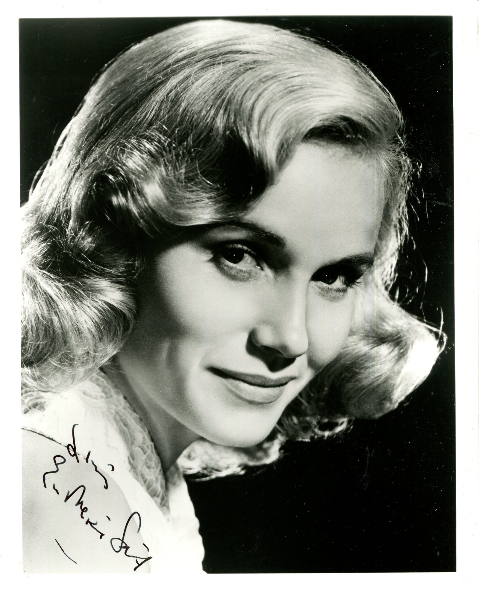 SAINT EVA MARIE: (1924- ): SAINT EVA MARIE: (1924- ) American actress, Academy Award winner for Best Supporting Actress in 1954 for her role as Edie Doyle in On the Waterfront. Signed 8 x 10 photograph of the smiling actress in