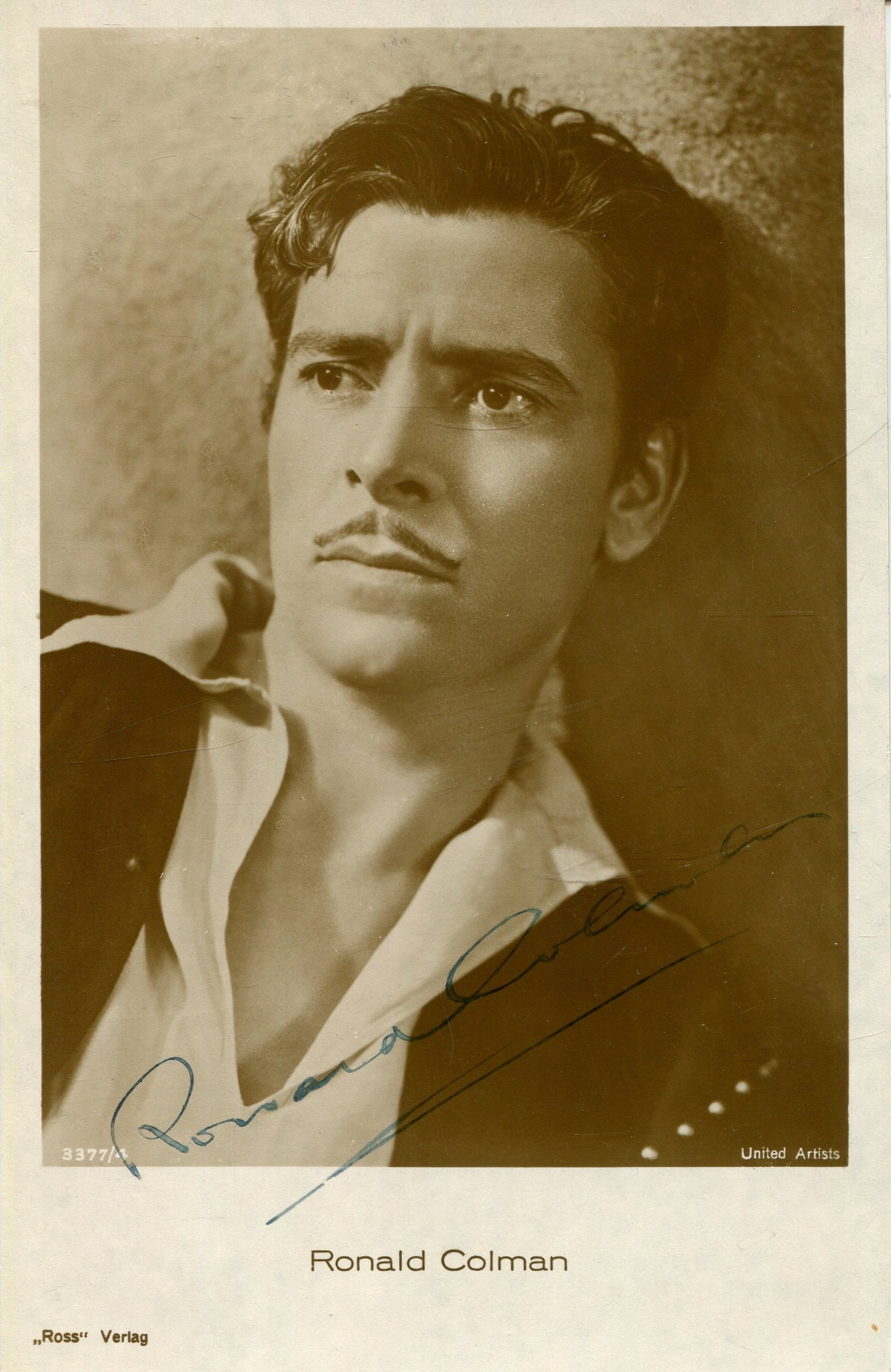 COLMAN RONALD: (1891-1958): COLMAN RONALD: (1891-1958) British actor, Academy Award winner for Best Actor in 1947 for his role as Anthony John in A Double Life. Vintage signed sepia 3.5 x 5.5 postcard photograph of the young