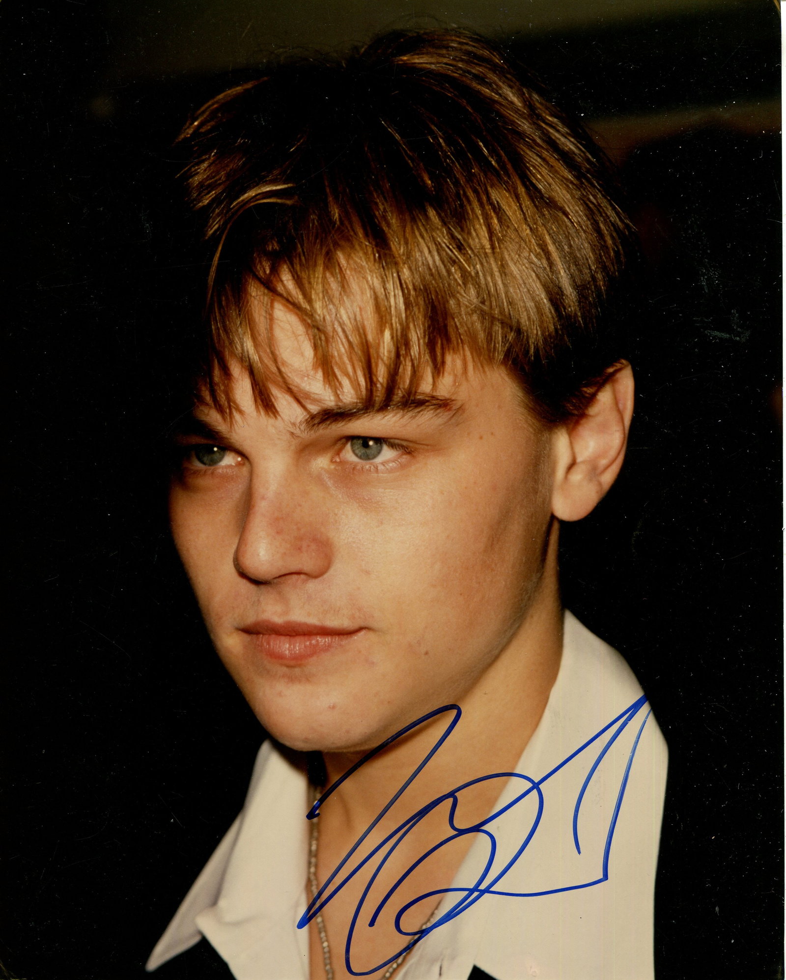 DICAPRIO LEONARDO: (1974- ): DICAPRIO LEONARDO: (1974- ) American actor, Academy Award winner for Best Actor in 2015 for his role as Hugh Glass in The Revenant. Signed colour 8 x 10 photograph of the young actor in a close-up