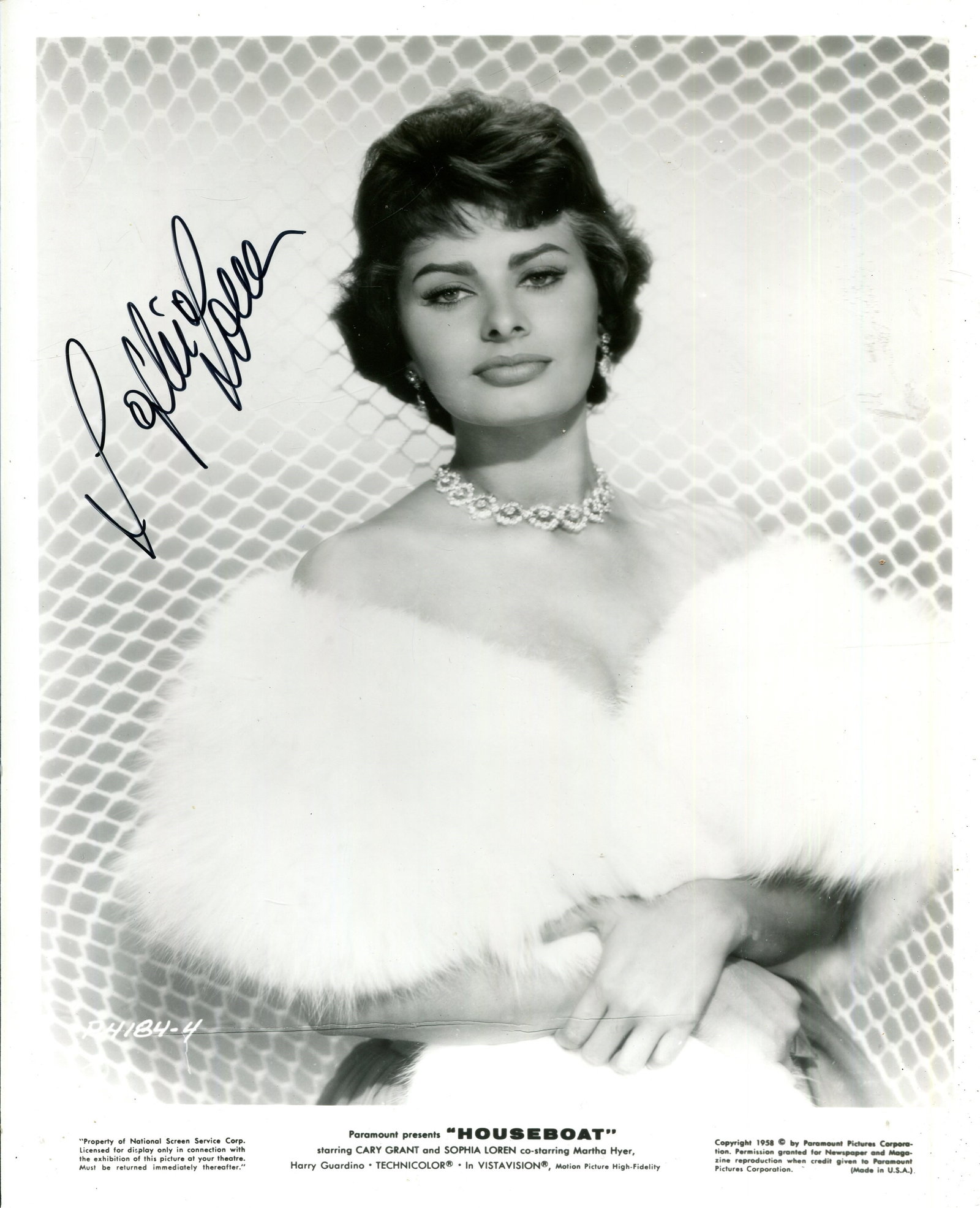 LOREN SOPHIA: (1934- ): LOREN SOPHIA: (1934- ) Italian actress, Academy Award winner for Best Actress in 1961 for her role as Cesira in La Ciociara. Signed 8 x 10 photograph of Loren in a glamorous half-length pose in
