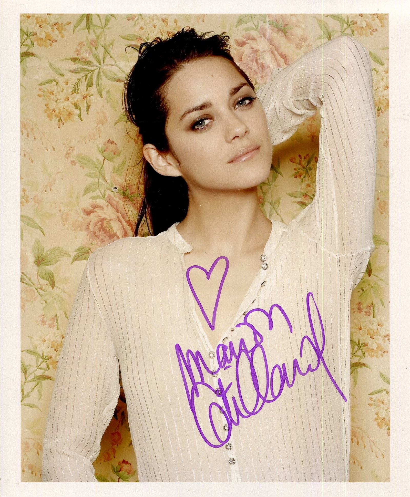COTILLARD MARION: (1975- ): COTILLARD MARION: (1975- ) French actress, Academy Award winner for Best Actress in 2007 for her role as Edith Piaf in La Vie en Rose. Signed colour 8 x 10 photograph of the actress standing in a