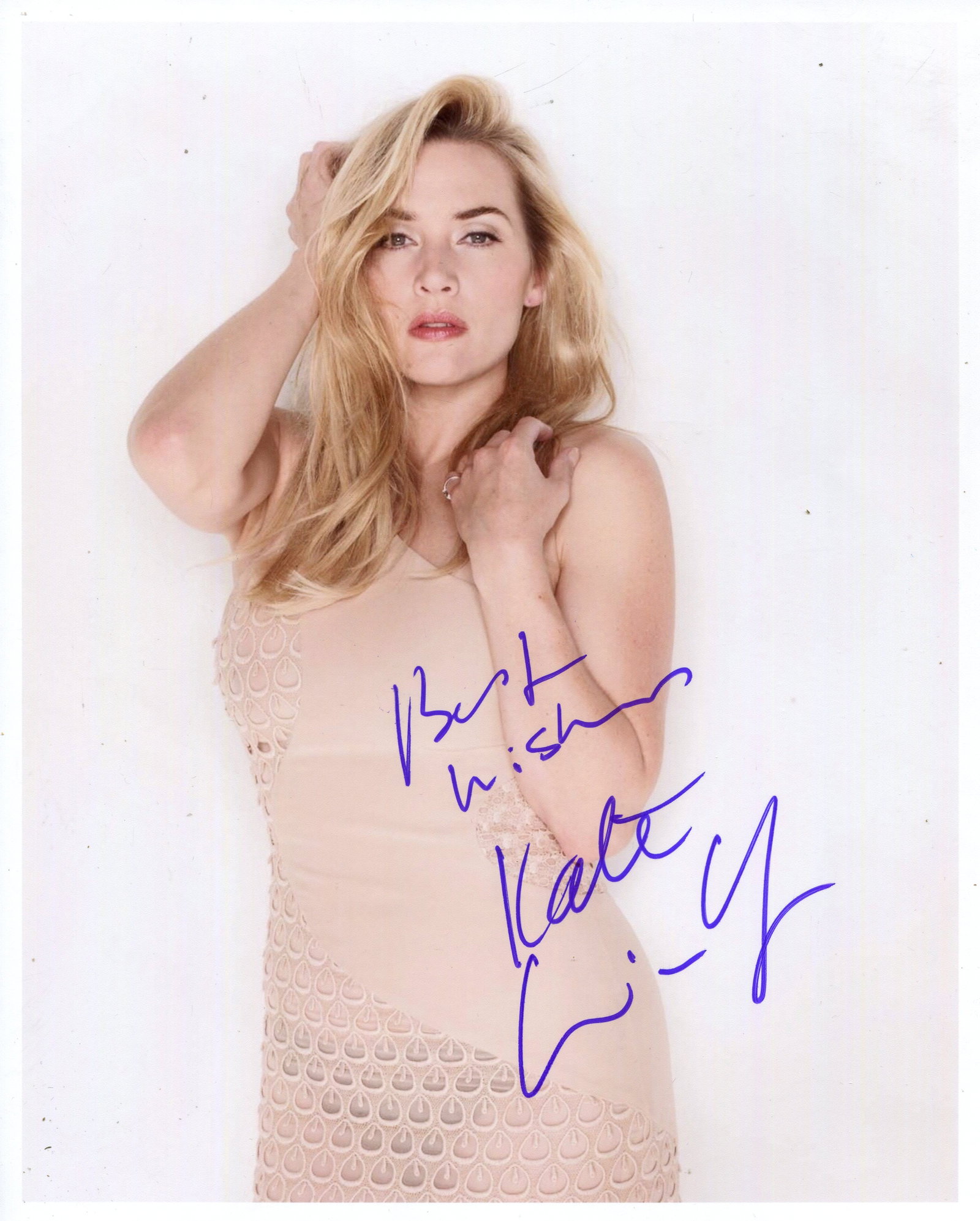 WINSLET KATE: (1975- ): WINSLET KATE: (1975- ) English actress, Academy Award winner. Signed colour 8 x 10 photograph of Winslet in an appealing half-length pose. Signed in blue ink to a light area of the image. EX.