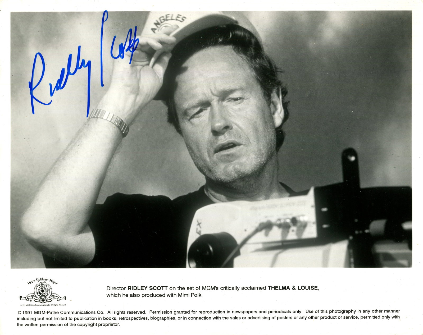 SCOTT RIDLEY: (1937- ): SCOTT RIDLEY: (1937- ) English film director. Signed 10 x 8 photograph by Scott, the promotional Metro Goldwyn Mayer showing him in a head and shoulders pose on the set of his crime drama film Thelma