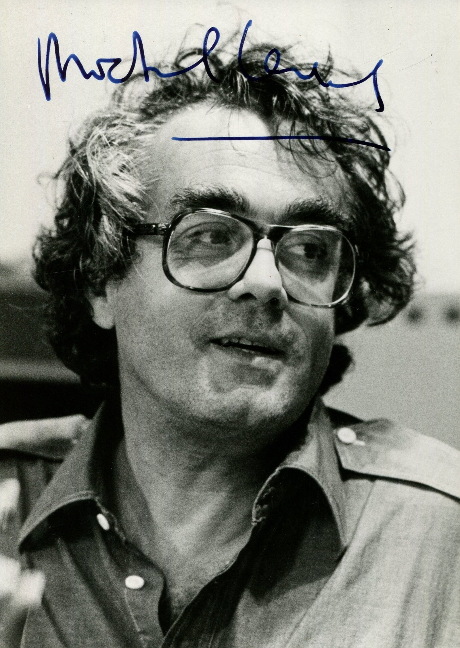 LEGRAND MICHEL: (1932-2019): LEGRAND MICHEL: (1932-2019) French composer of film scores, Academy Award winner. Signed 5 x 7 photograph of Legrand in a head and shoulders pose. Signed in bold blue fountain pen ink with his name