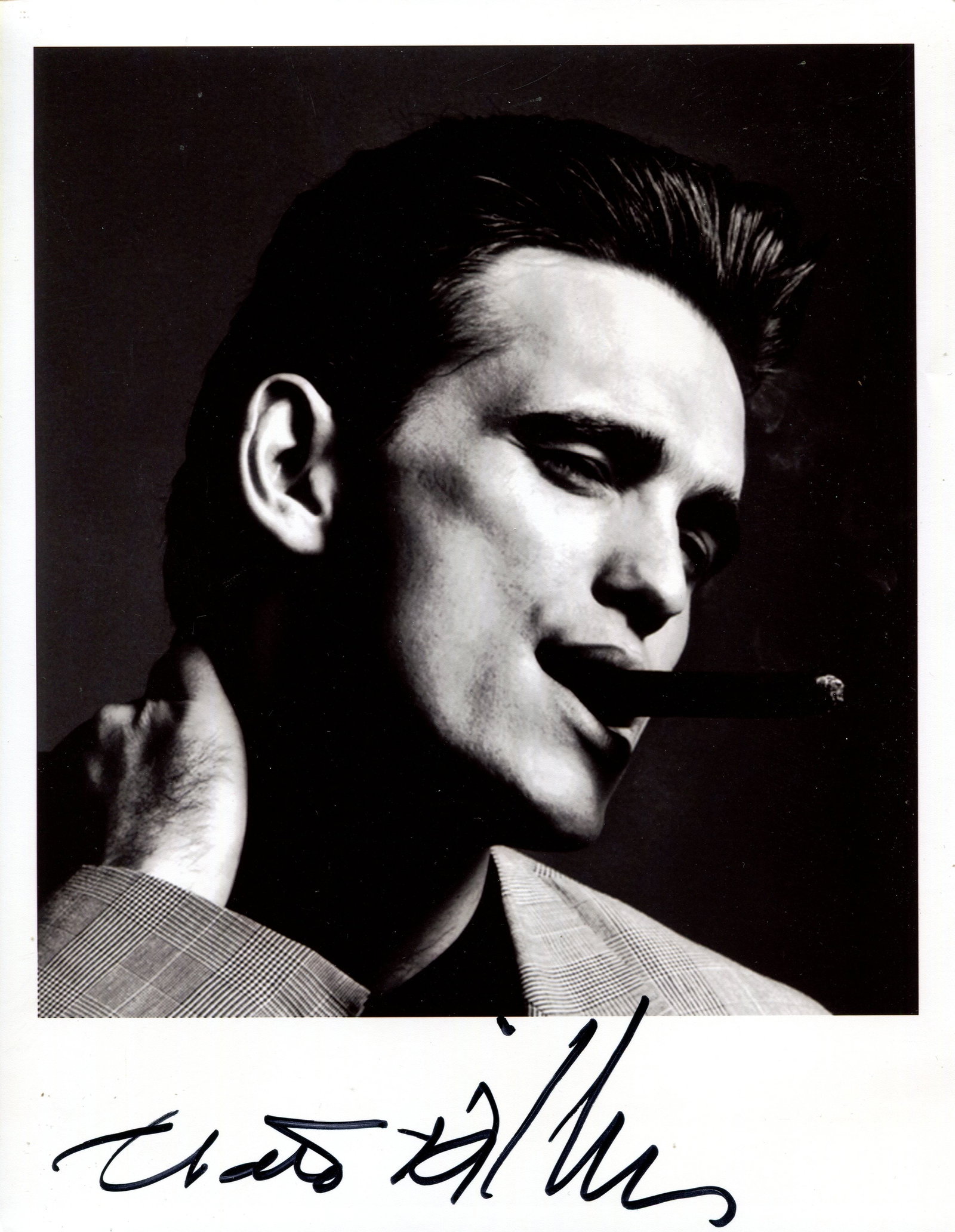 DILLON MATT: (1964- ): DILLON MATT: (1964- ) American Actor, an Academy Award nominee. Signed 8 x 10 photograph by Dillon, the image depicting him in a head and shoulders pose, smoking a cigar. Signed in bold black ink to