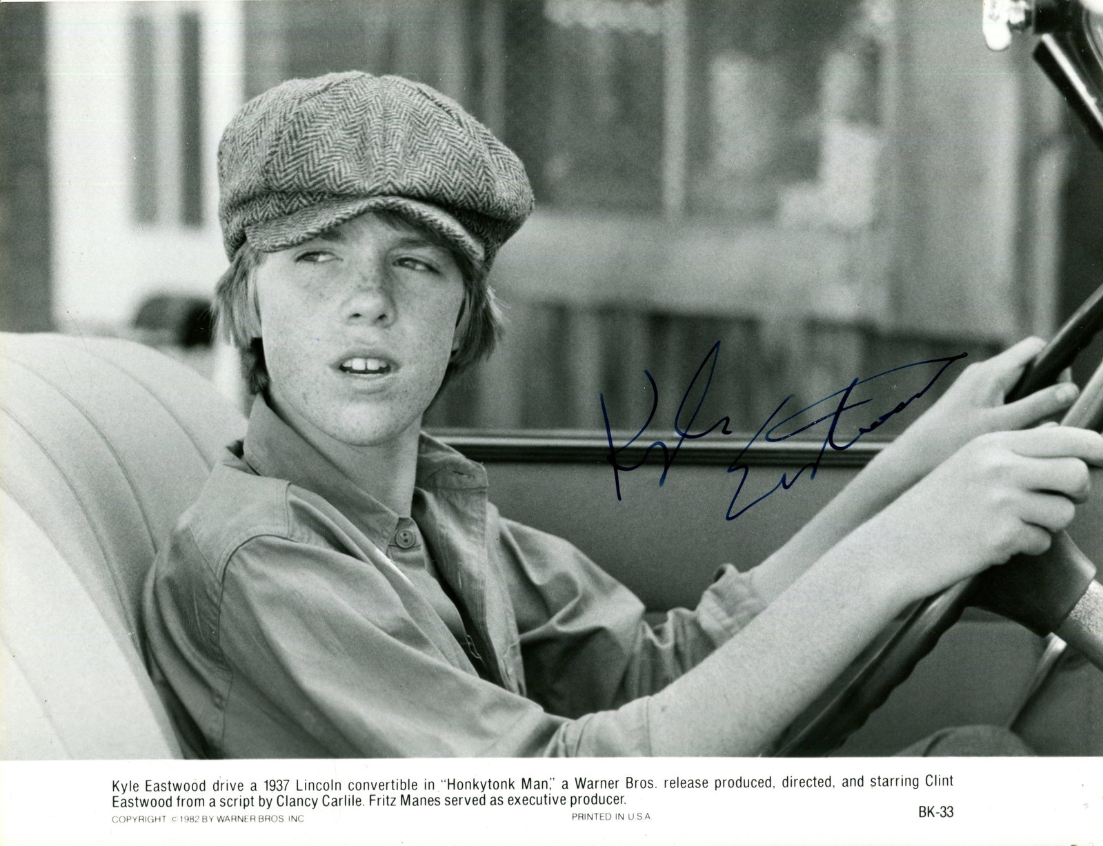 EASTWOOD KYLE: (1968- ): EASTWOOD KYLE: (1968- ) American film composer, actor and jazz bassist, the son of Clint Eastwood. A scarce signed 9.5 x 7 photograph of Eastwood in a head and shoulders pose in costume as Whit