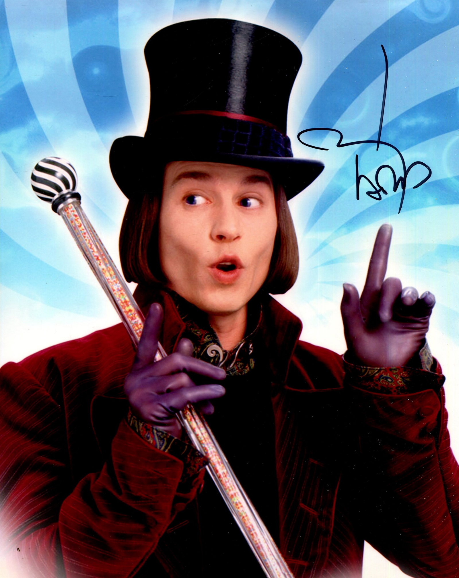 DEPP JOHNNY: (1963- ): DEPP JOHNNY: (1963- ) American Actor. Signed colour 8 x 10 photograph of Depp in a half-length pose, in costume as Willy Wonka, in his leading role from Tim Burton´s fantasy musical film Charlie