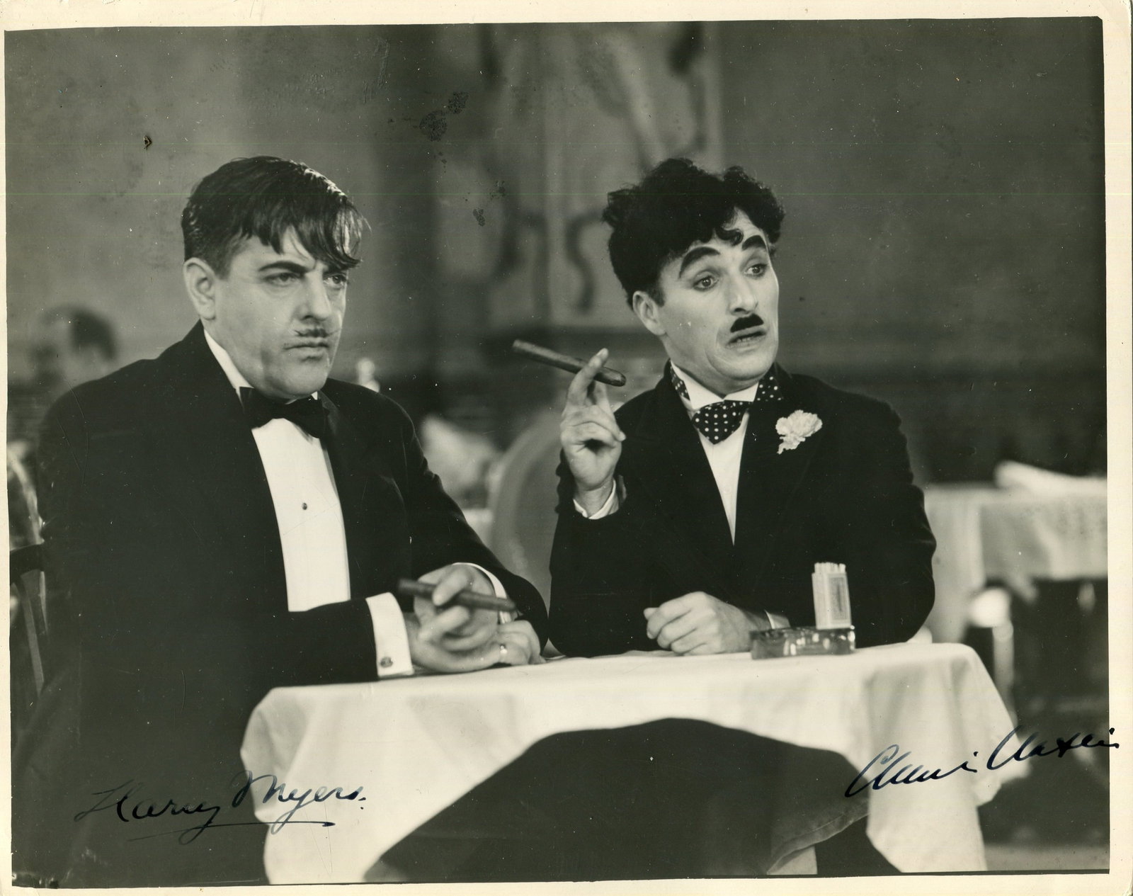 CITY LIGHTS:: CITY LIGHTS: An excellent vintage signed 10 x 8 photograph by both Charles Chaplin (The Tramp) and Harry Myers (an eccentric alcoholic millionaire) individually, the image depicting the two actors