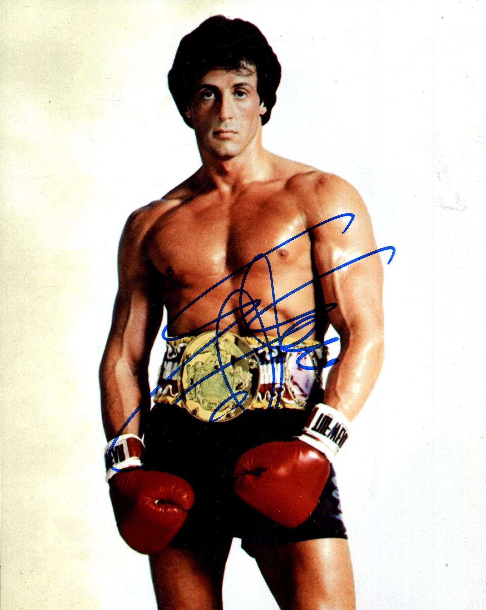 STALLONE SYLVESTER: (1946- ): STALLONE SYLVESTER: (1946- ) American Actor, an Academy Award nominee. Signed colour 8 x 10 photograph by Stallone, the image depicting the actor in a three-quarter length pose, wearing his boxing