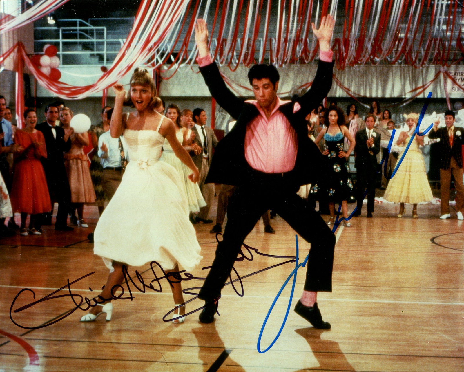 GREASE:: GREASE: Signed colour 10 x 8 photograph by both John Travolta (Danny Zuko) and Olivia Newton-John (Sandy Olsson) individually, the image depicting the duo in a full-length dance routine together in