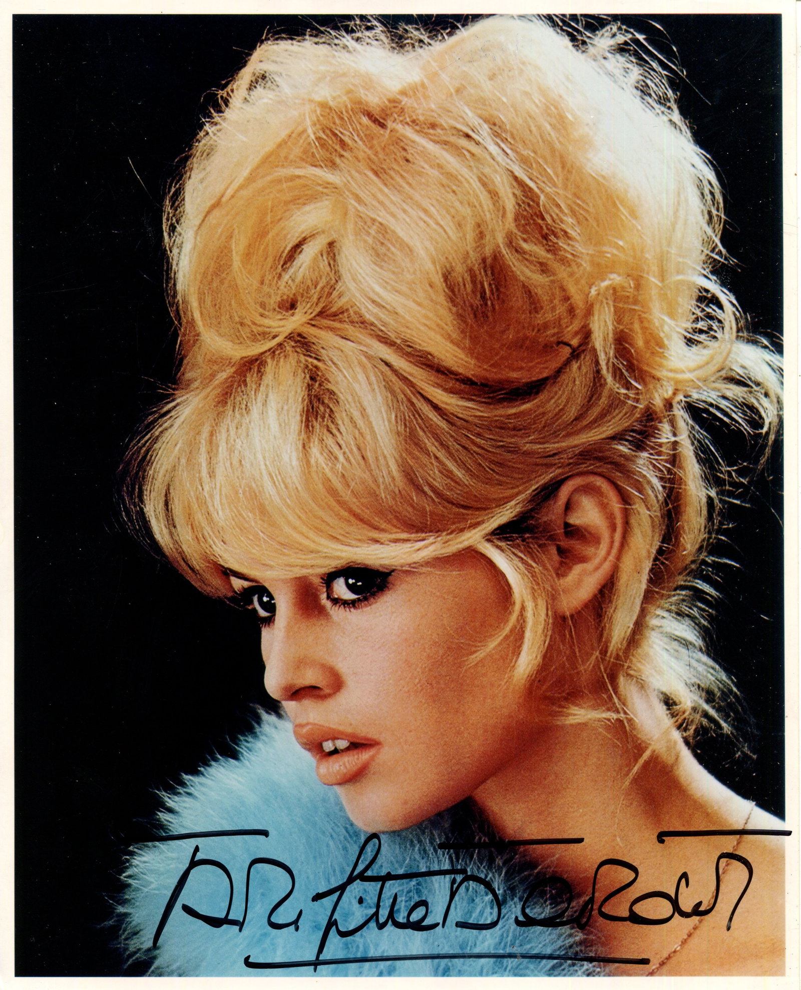 BARDOT BRIGITTE: (1934-2025): BARDOT BRIGITTE: (1934-2025) French actress and sex symbol. Signed colour 8 x 10 photograph, an appealing head and shoulders study of the actress with her blonde hair arranged in a topknot. Signed by 