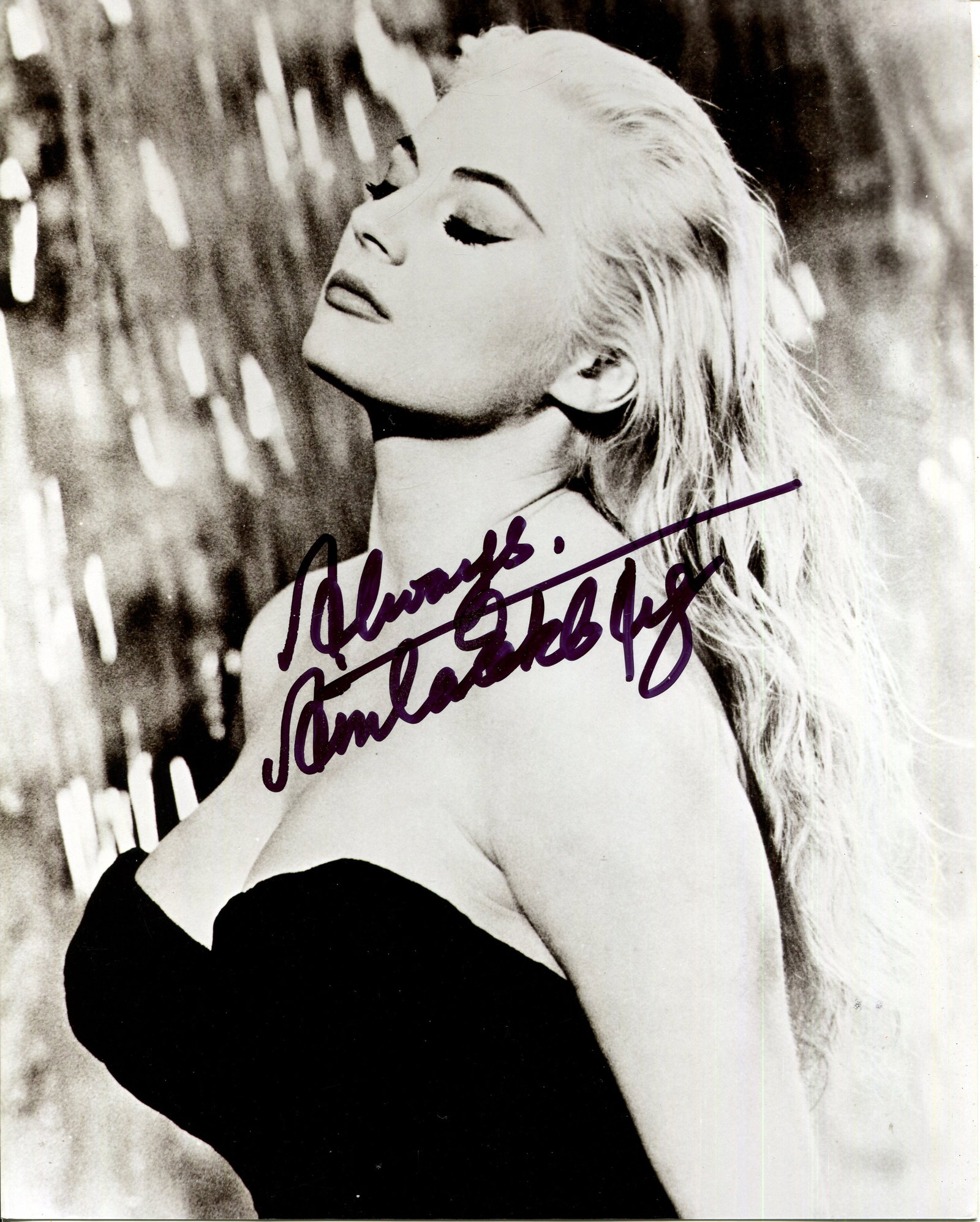 EKBERG ANITA: (1931-2015): EKBERG ANITA: (1931-2015) Swedish actress. Signed 8 x 10 photograph of Ekberg in a classic head and shoulders pose in costume as Sylvia Rank, with the Trevi Fountain visible in the background, from