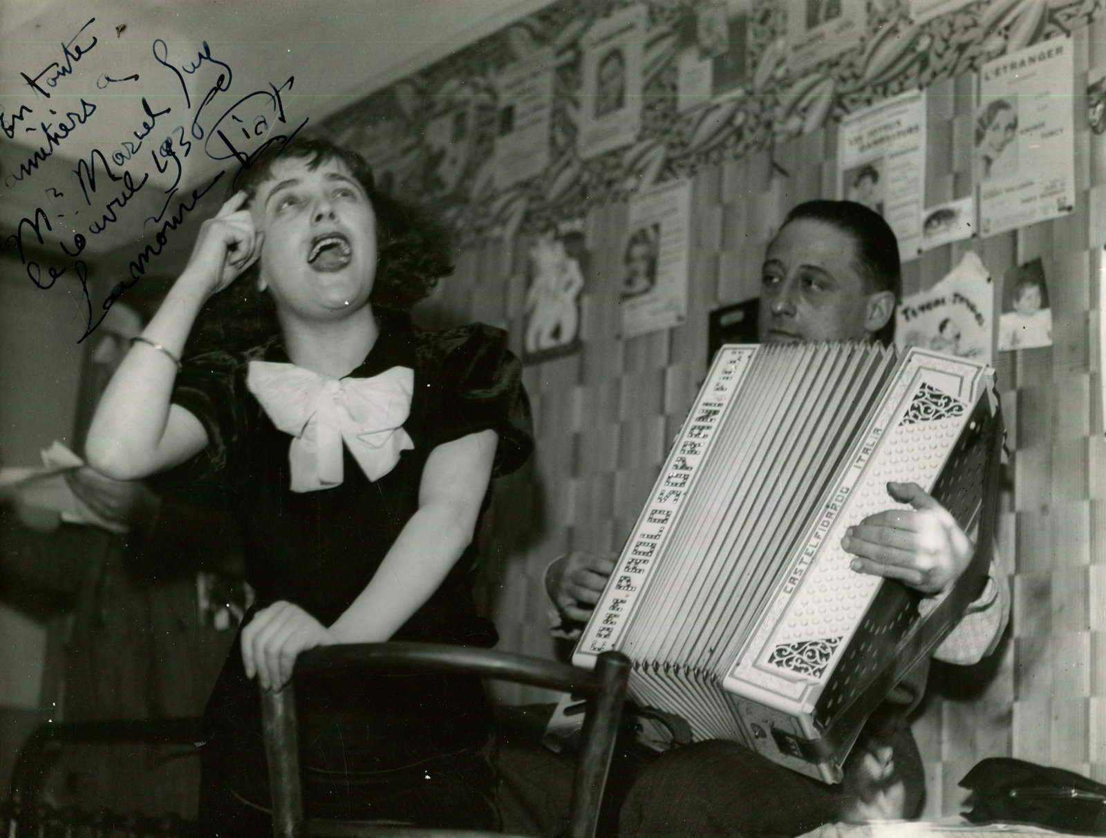PIAF EDITH: (1915-1963) A rare, early signed image of ´ La Môme Piaf´: PIAF EDITH: (1915-1963) French singer. An extraordinary, early vintage signed and inscribed 9.5 x 7 photograph of the young Piaf in a three-quarter length pose singing energetically, accompanied by