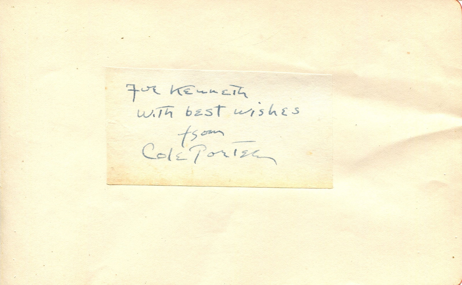 PORTER COLE: (1891-1964): PORTER COLE: (1891-1964) American composer and songwriter. Vintage blue fountain pen ink signature and inscription (´For Kenneth, with best wishes from Cole Porter´) on a small oblong 12mo