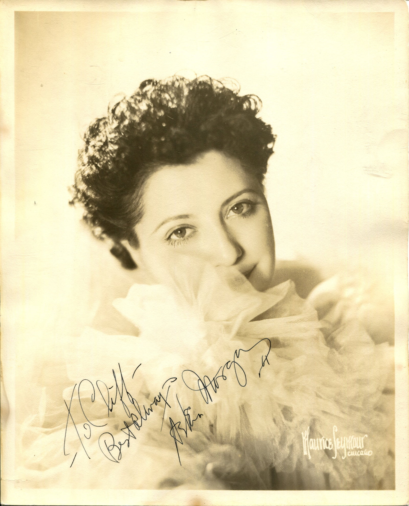 MORGAN HELEN: (1900-1941): MORGAN HELEN: (1900-1941) American jazz singer and actress. A scarce vintage signed and inscribed sepia 8 x 10 photograph of the quintessential torch singer in a head and shoulders pose. Photograph
