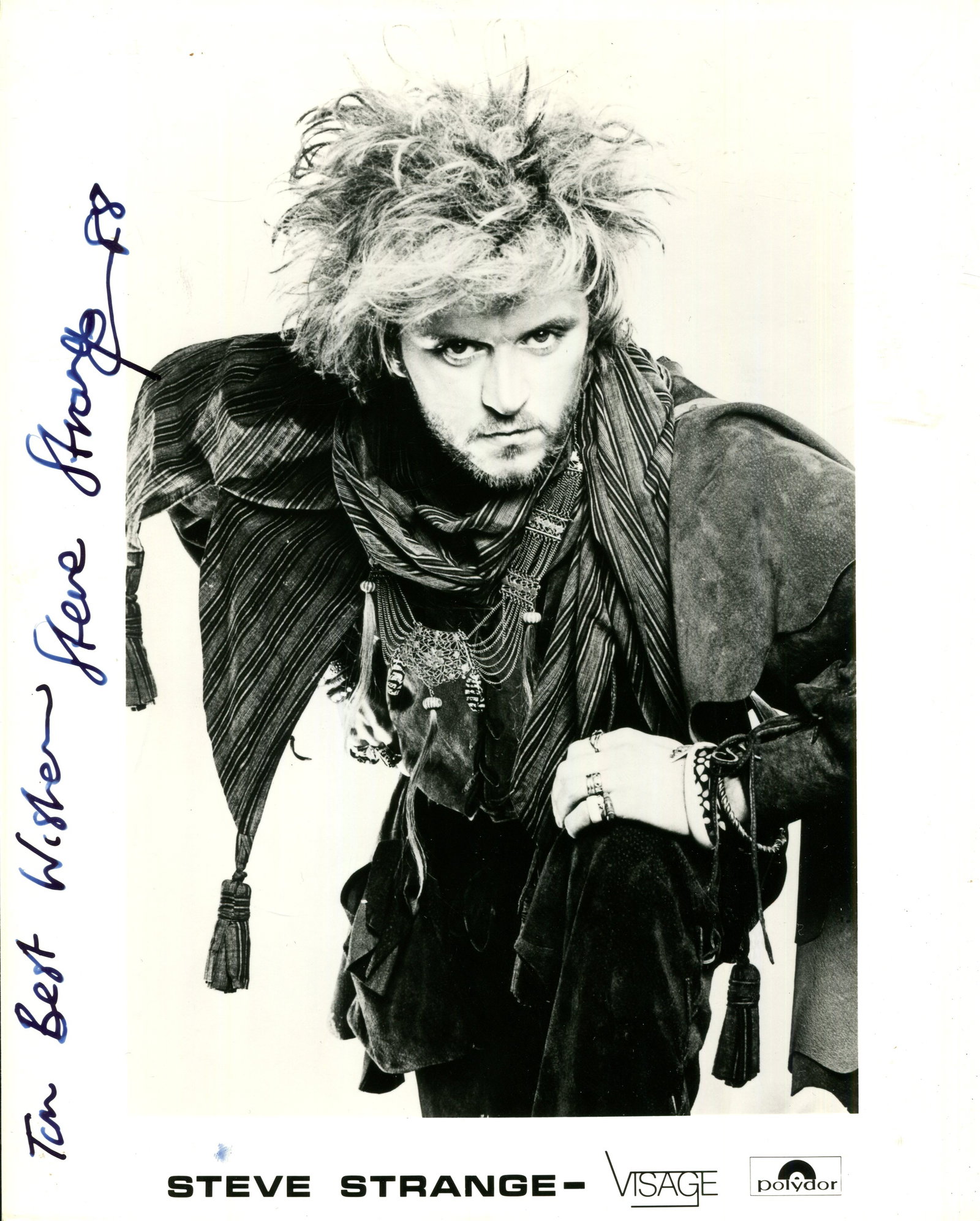 STRANGE STEVE: (1959-2015): STRANGE STEVE: (1959-2015) Welsh singer and nightclub host and promoter, associated with the New Romantic subcultural movement of the late 1970s and early 1980s. A scarce signed and inscribed 8 x 10