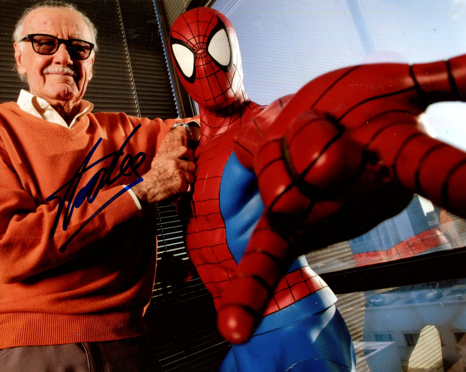 LEE STAN: (1922-2018): LEE STAN: (1922-2018) American comic book writer, formerly editor-in-chief of Marvel Comics and co-creator of Spider-Man. Signed colour 10 x 8 photograph of Lee standing in a half-length pose resting