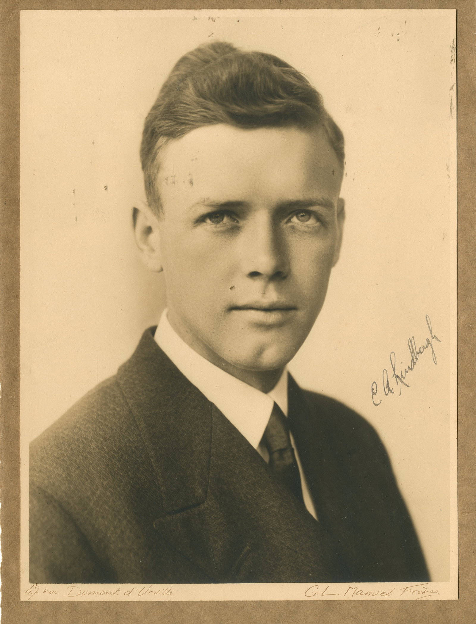 LINDBERGH CHARLES: (1902-1974) A stunning signed portrait of Lucky Lindy: LINDBERGH CHARLES: (1902-1974) American aviator who made the first solo non-stop flight across the Atlantic from Paris to New York in the Spirit of St. Louis, May 1927. A very fine vintage signed
