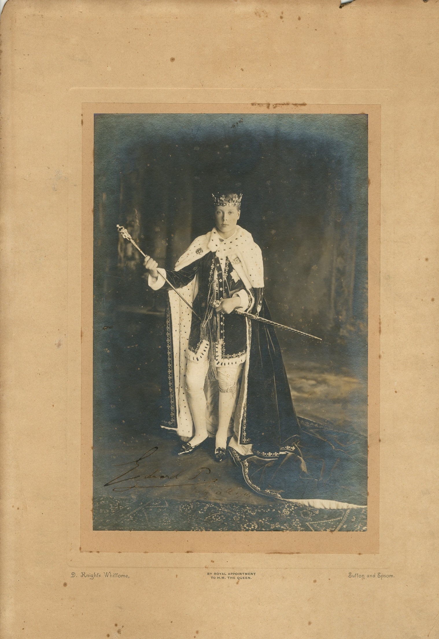 EDWARD VIII: (1894-1972) Signed on the day of his historic investiture as Prince of Wales: EDWARD VIII: (1894-1972) King of the United Kingdom January - December 1936. Later Duke of Windsor. A good, large vintage signed 12.5 x 17.5 photograph, the historic image depicting the young Prince