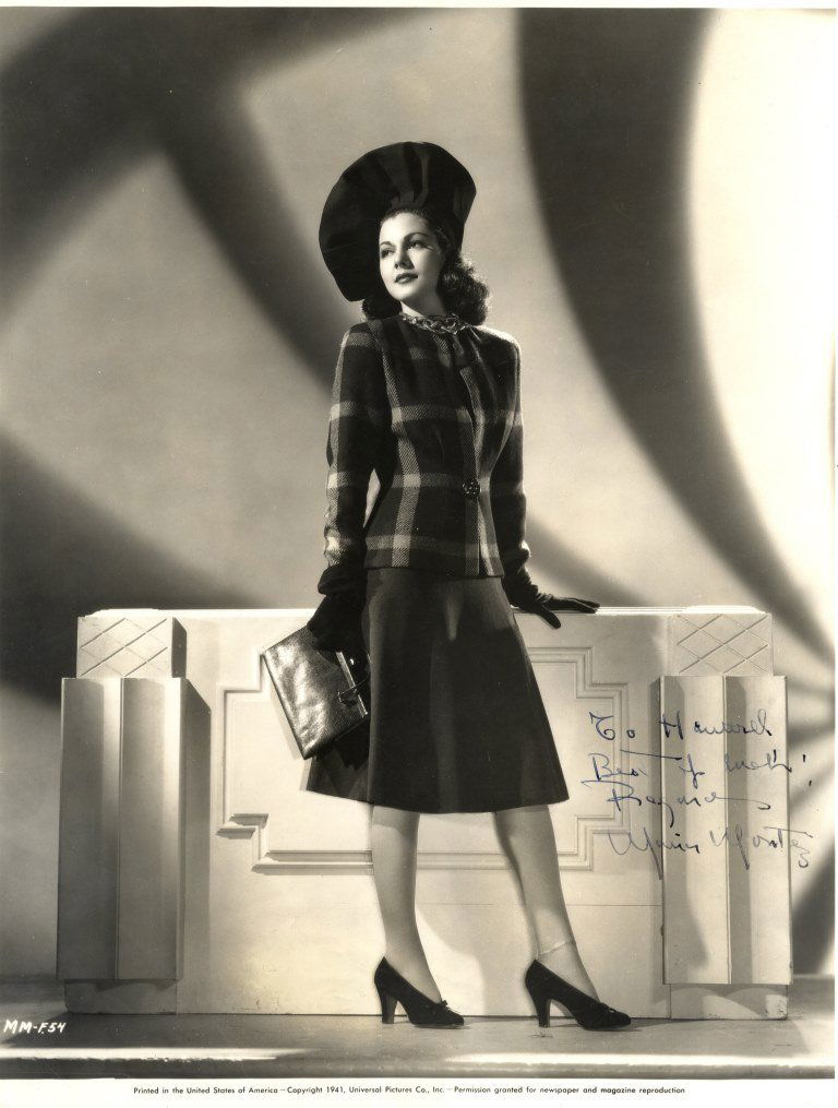 MONTEZ MARIA: (1912-1951) Dominican Republic-born: MONTEZ MARIA: (1912-1951) Dominican Republic-born Actress. Rare, vintage signed and inscribed 11 x 14 photograph of Montez standing in an elegant full length pose. The original Universal Pictures publ