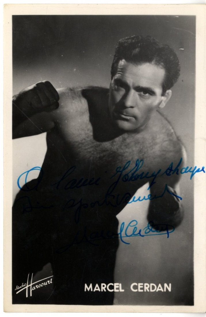 CERDAN MARCEL: (1916-1949) French Boxer, World Middlewe: CERDAN MARCEL: (1916-1949) French Boxer, World Middleweight Champion 1948-49. Vintage signed and inscribed 4 x 6 postcard photograph of Cerdan standing in a three quarter length boxing pose. Photograp