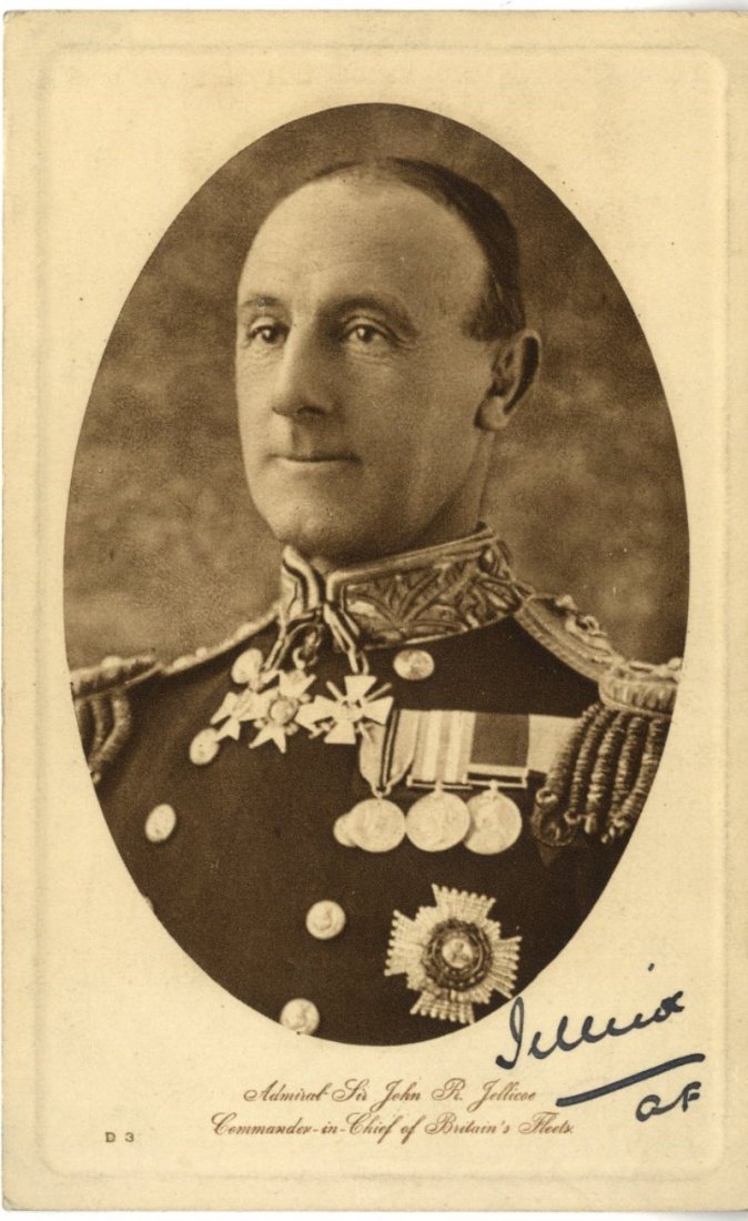 JELLICOE EARL: (1859-1935) British Admiral of the Fleet: JELLICOE EARL: (1859-1935) British Admiral of the Fleet of World War I. Vintage signed sepia postcard photograph, the oval image depicting Jellicoe in a head and shoulders pose wearing his uniform and