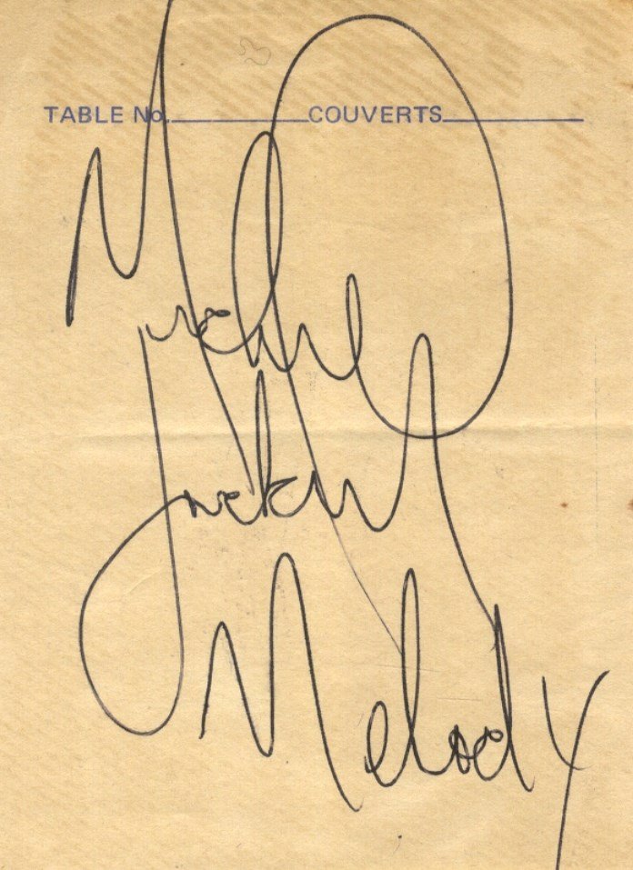 JACKSON MICHAEL: (1958-2009) American Pop Singer. Bold: JACKSON MICHAEL: (1958-2009) American Pop Singer. Bold black ink signature ('Michael Jackson') and inscription on a small printed restaurant slip. Some extremely minor, very light age toning, VG