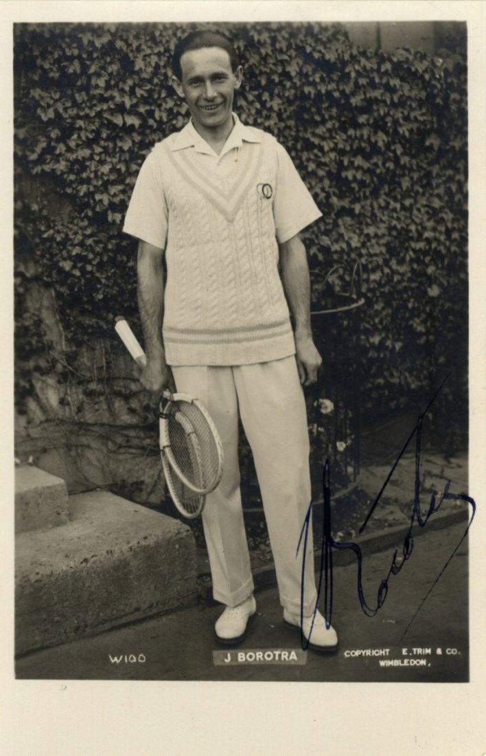 BOROTRA JEAN: (1898-1994) French Tennis Player,: BOROTRA JEAN: (1898-1994) French Tennis Player, Wimbledon Champion 1924 & 1926. Vintage signed postcard photograph of Borotra standing in a full length pose holding two tennis rackets in one hand. Pho