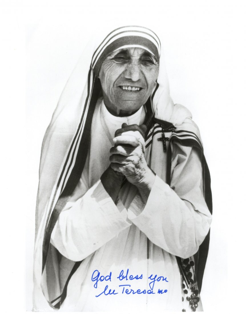 TERESA MOTHER: (1910-1997) Albanian Roman Catholic Nun,: TERESA MOTHER: (1910-1997) Albanian Roman Catholic Nun, Nobel Peace Prize winner, 1979. Signed 8 x 10 photograph of Mother Teresa standing in a half length pose with her hands clasped together in pray