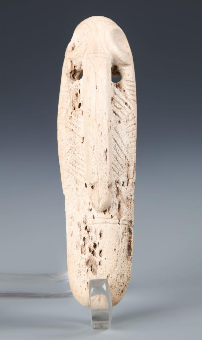 Taino Pendant (1000-1500 CE): Taino Pendant (1000-1500 CE). Big beak bird made of bone. Size: 4'' x 1'' x 1'' (10 x 3 x 3 cm). Provenance: Larry Roberts, author of Taino Sculpture: Art of the Gods.