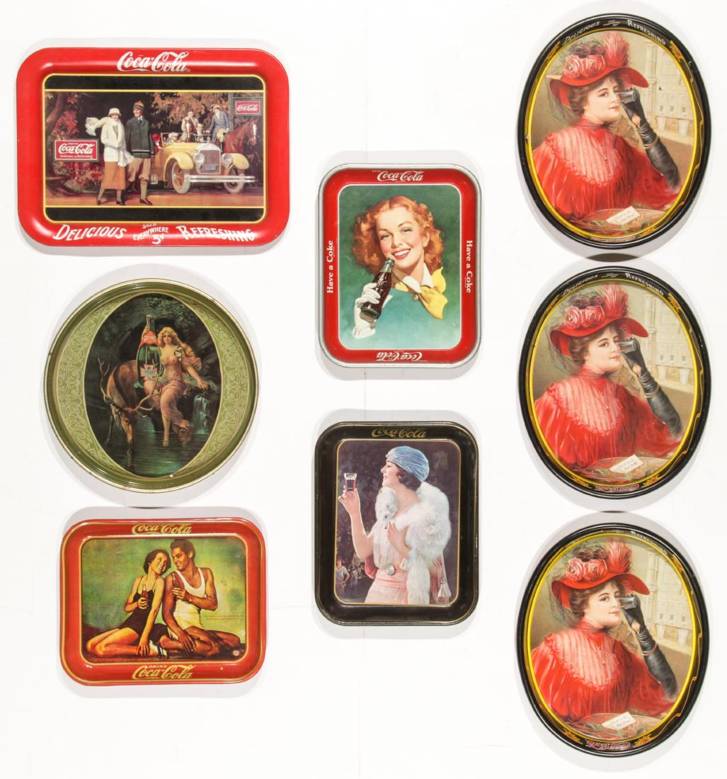 Group of 8 Coca-Cola Advertising Trays: Group of 8 Coca-Cola Advertising Trays. Largest Size: 1'' x 17.5'' x 12.75'' (3 x 44 x 32 cm).