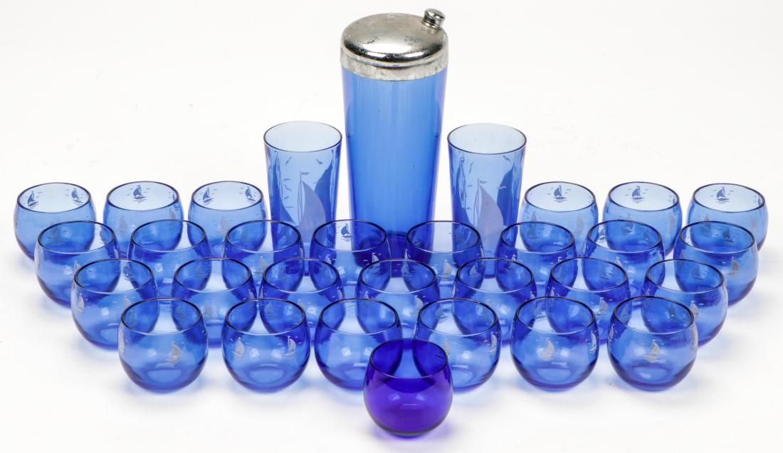31 pc Hazel Atlas Style Cobalt Blue Barware Set: 31 pc Hazel Atlas Style Cobalt Blue Barware Set:Sailboat Set glasses with Cocktail Shaker. Ranging in size from: 9.5'' x 3.75'' x 3.75'' (24 x 10 x 10 cm) to 2.5'' x 2.75'' x 2.75'' (6 x 7 x 7 cm).