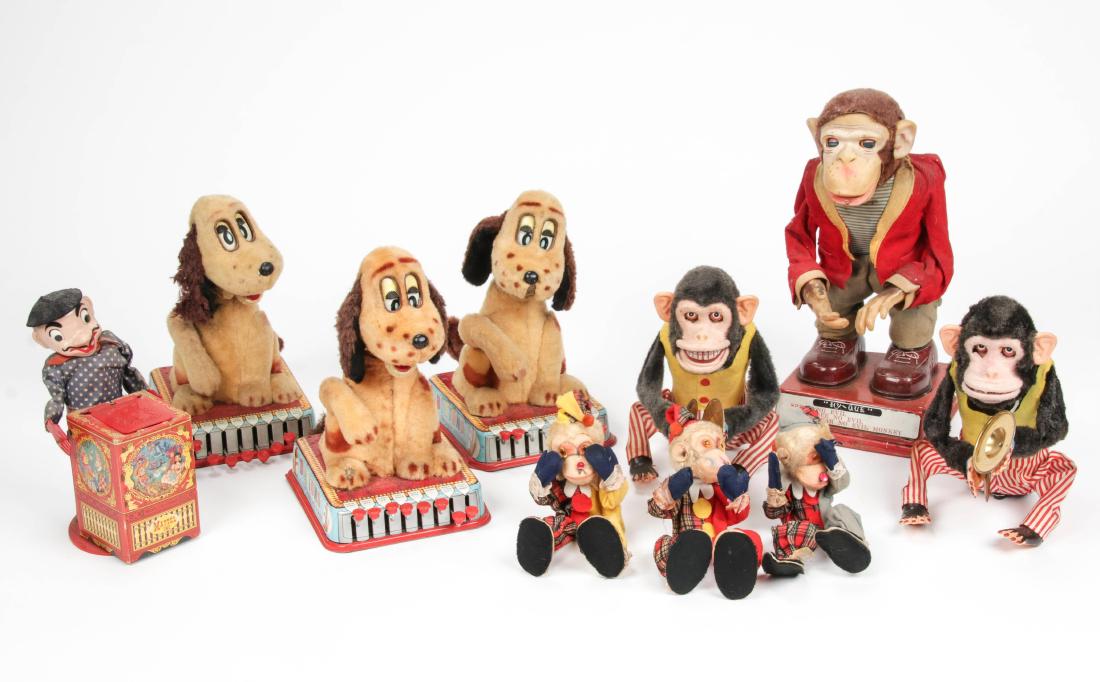 10 pc Estate Lot of Animatronic Toys: 10 pc Estate Lot of Animatronic Toys, including "Hy-Que", 3 "Buttons, the Puppy with a Brain", 2 clapping cymbal monkeys, and one Mattel Inc. "Jack-in-the-Box". Largest Size: 16'' x 8'' x 8'' (41 x 20
