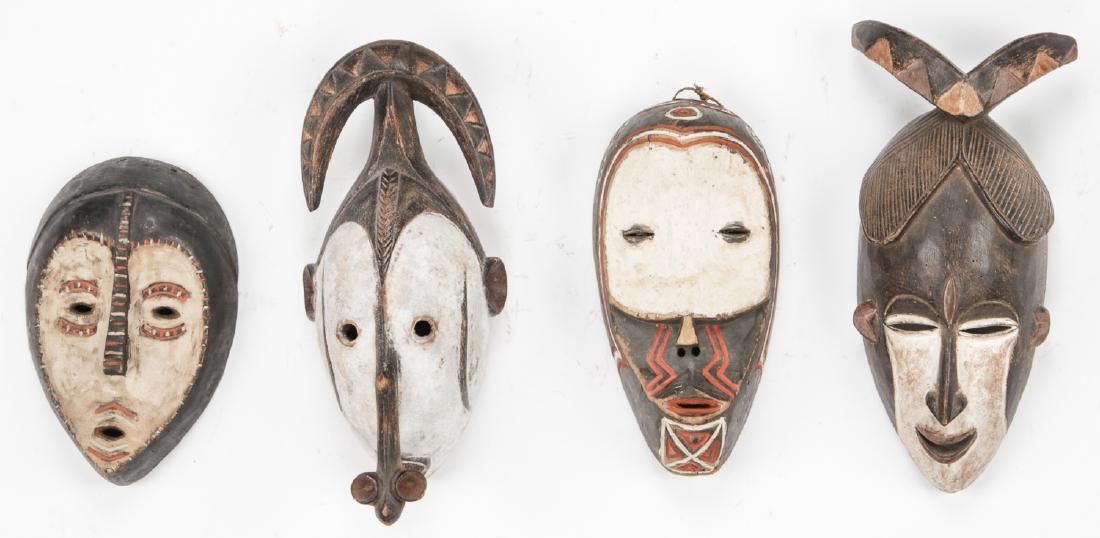 4 African Carved Wood Masks (1 of 2)
